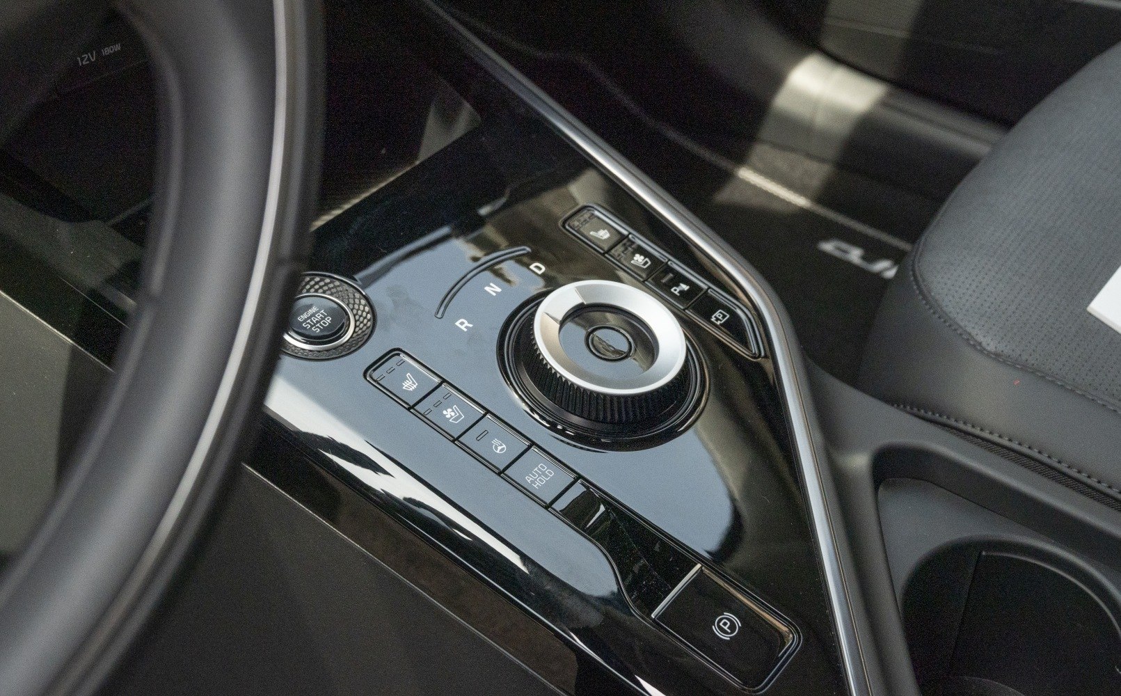 rotary gear shift dial and engine start/stop button