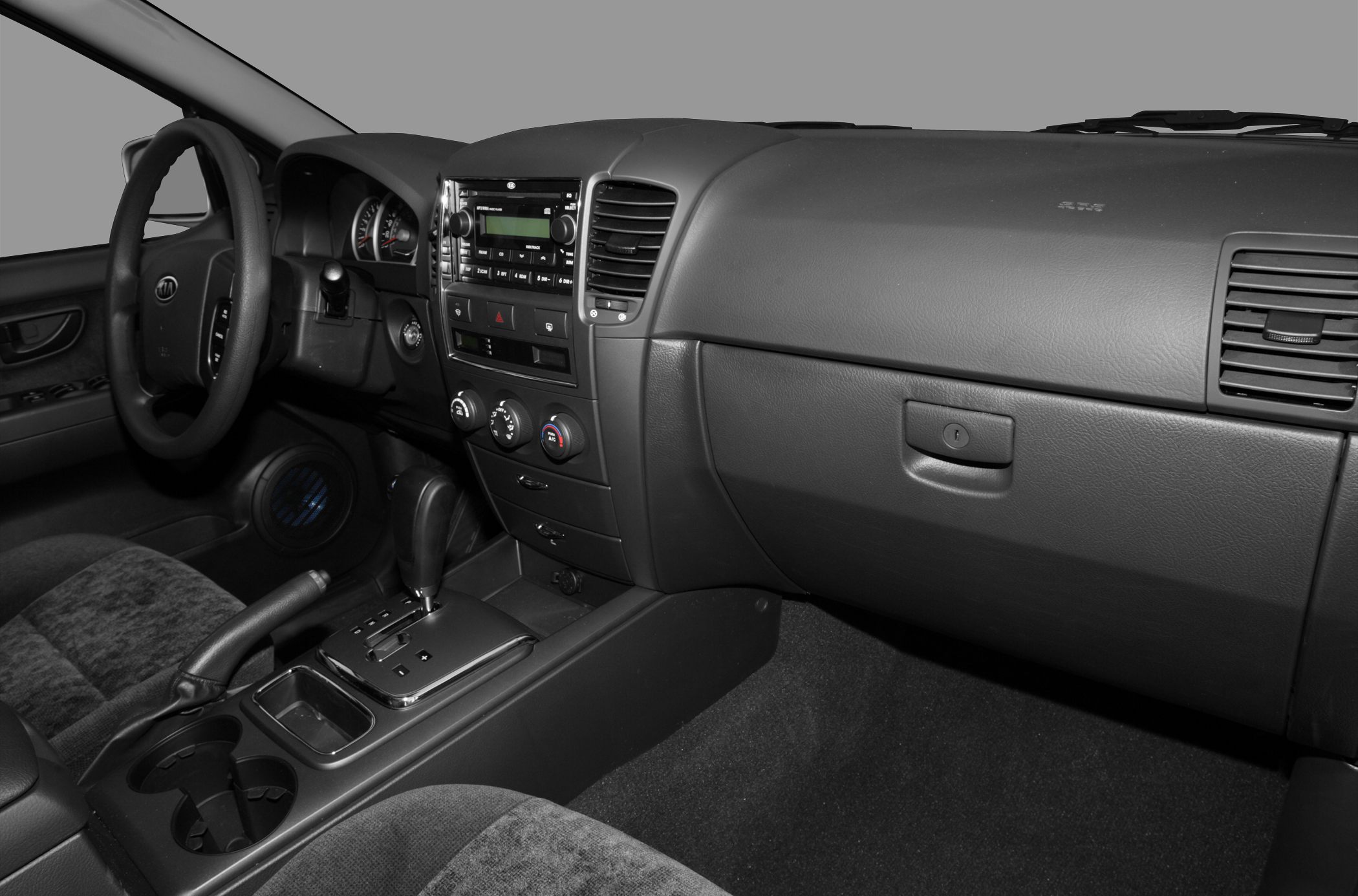 Dashboard, steering wheel, and console with automatic gear shifter