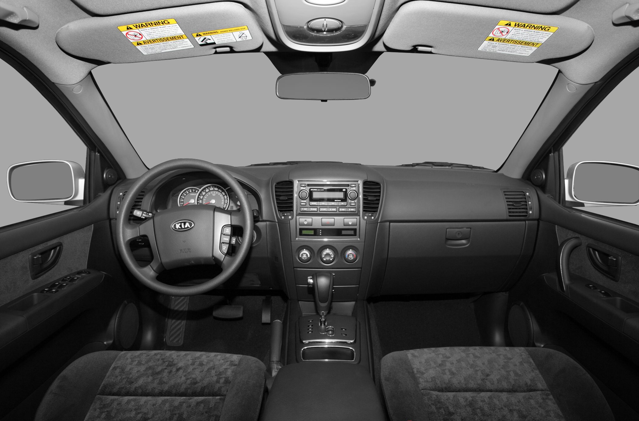 Dashboard, steering wheel, center console with radio and climate controls