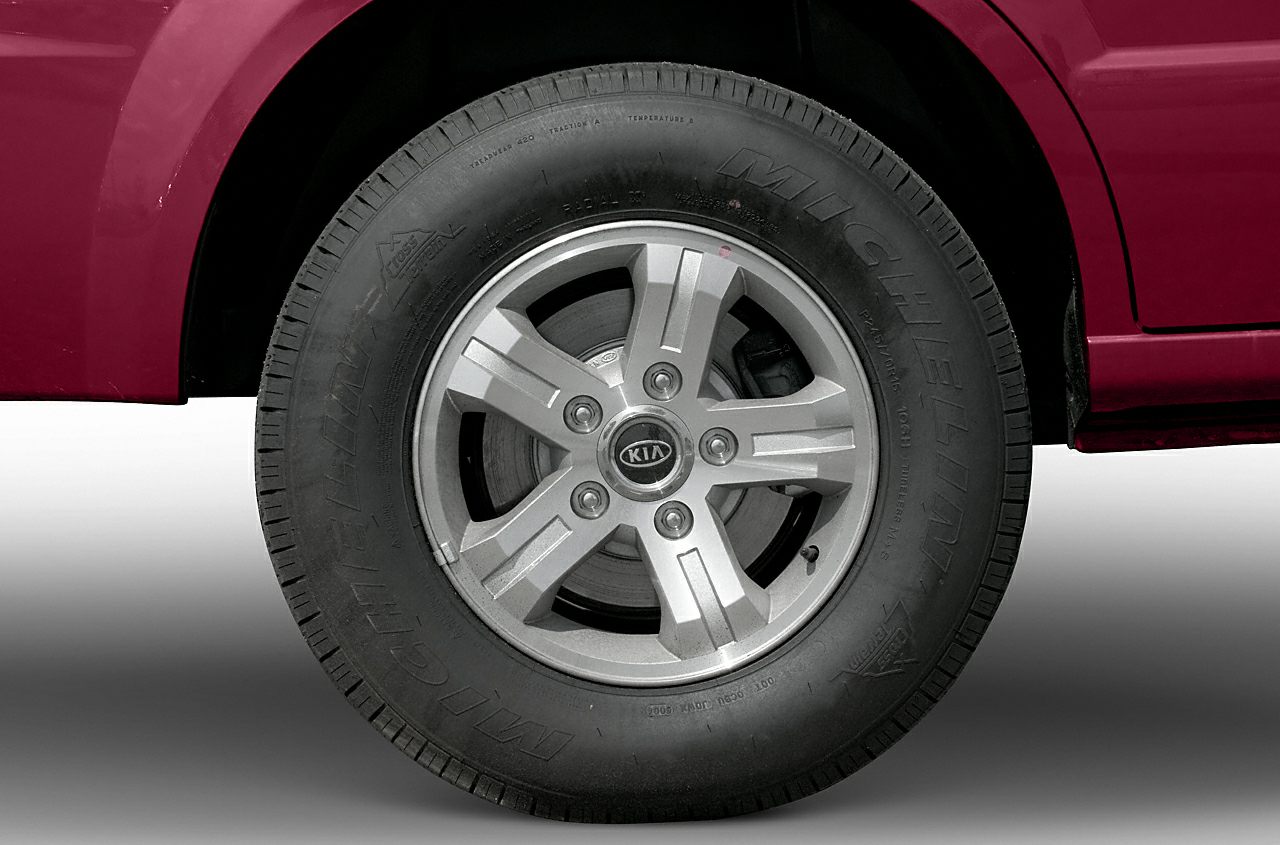 Close-up of alloy wheel and Michelin tire on a vehicle.