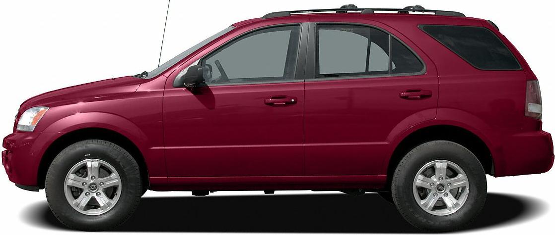 Side profile of a 4-door SUV with roof rails and alloy wheels