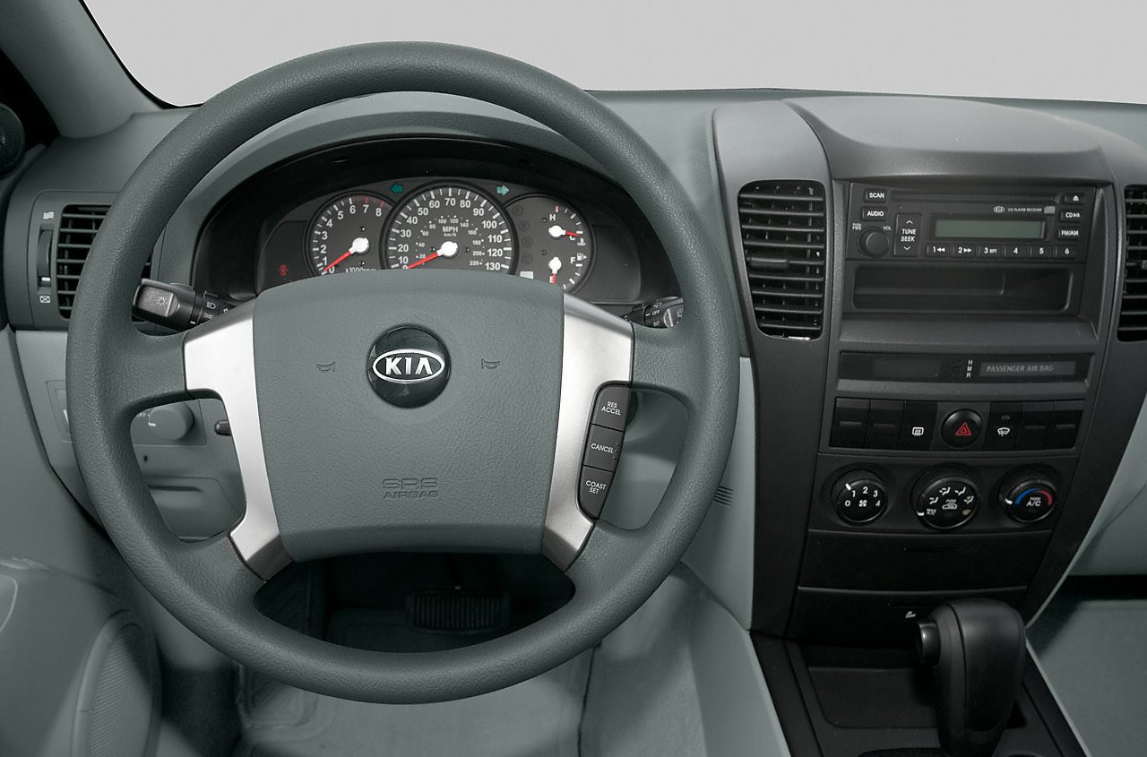 Steering wheel, instrument panel, and center console with radio and climate controls