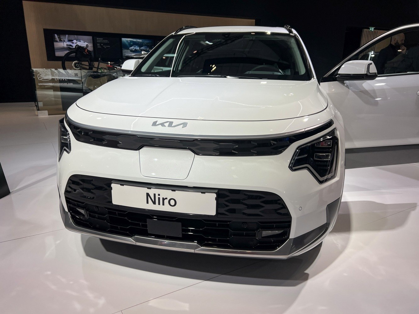Front view with distinctive headlights and bold hexagonal grille