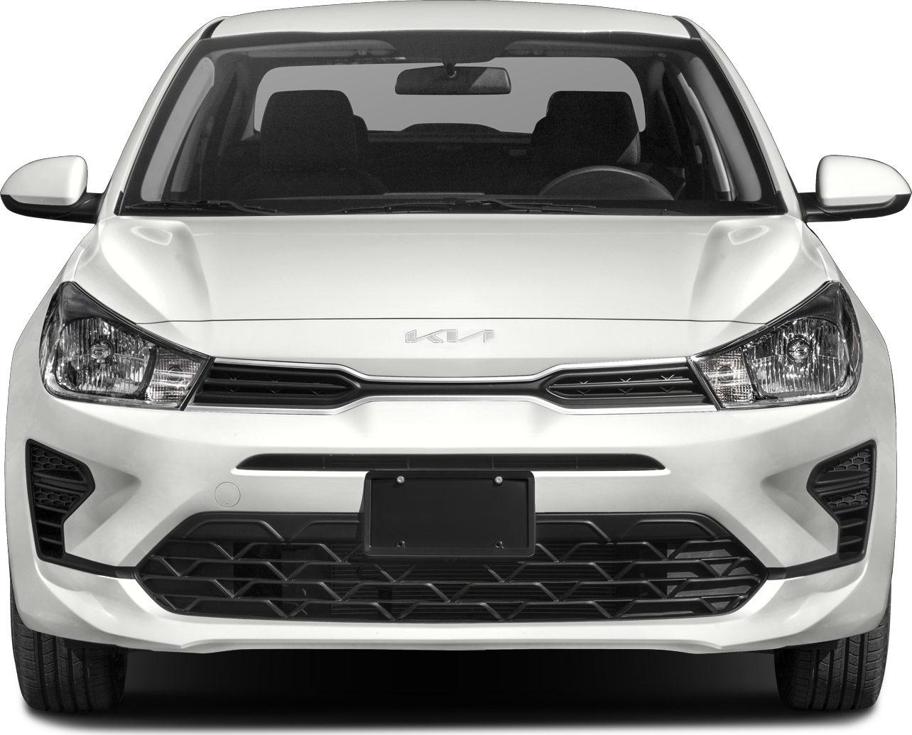 Front view with grille, headlights, and bumper of compact sedan