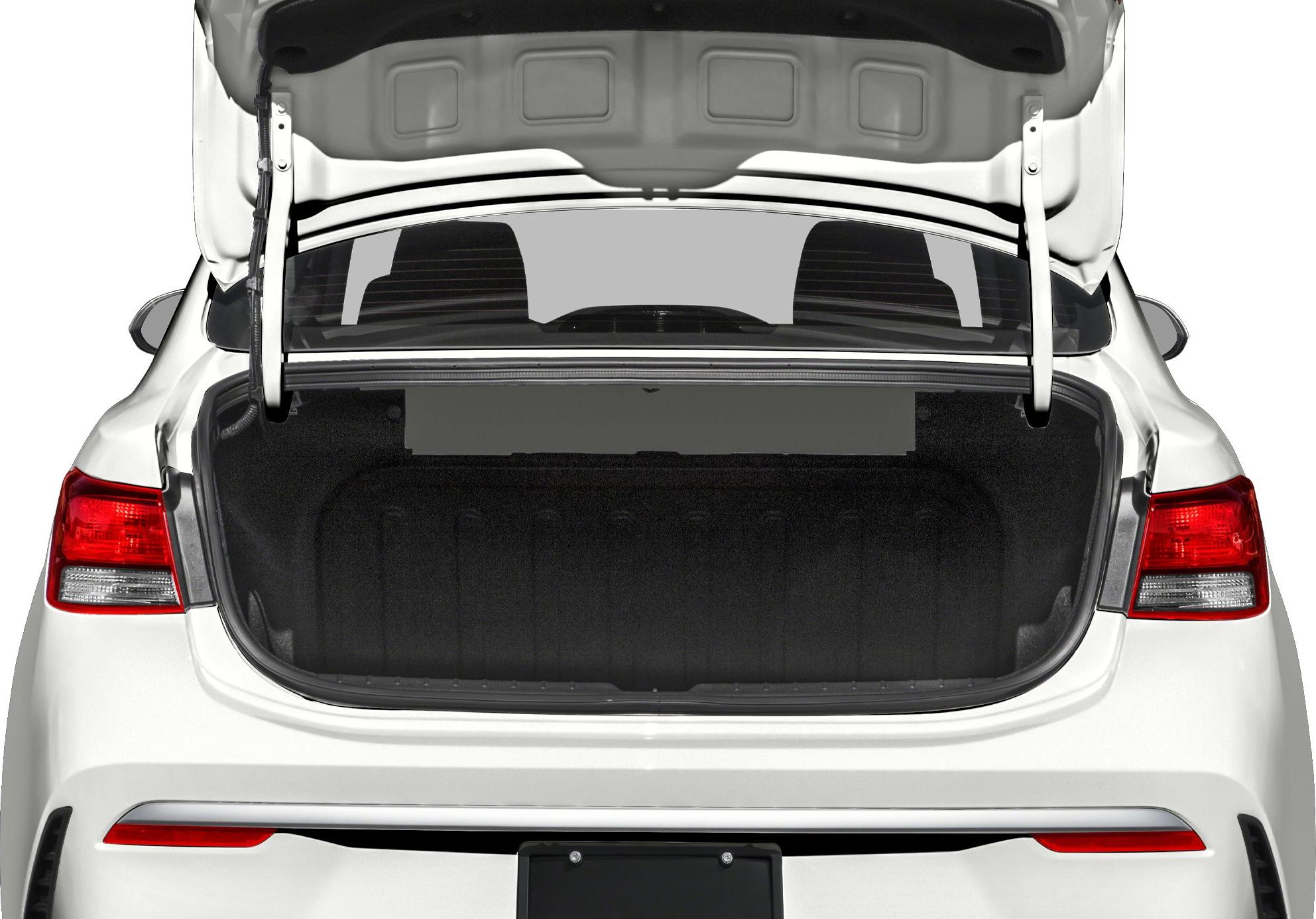 Open rear trunk showing spacious sedan storage and taillights