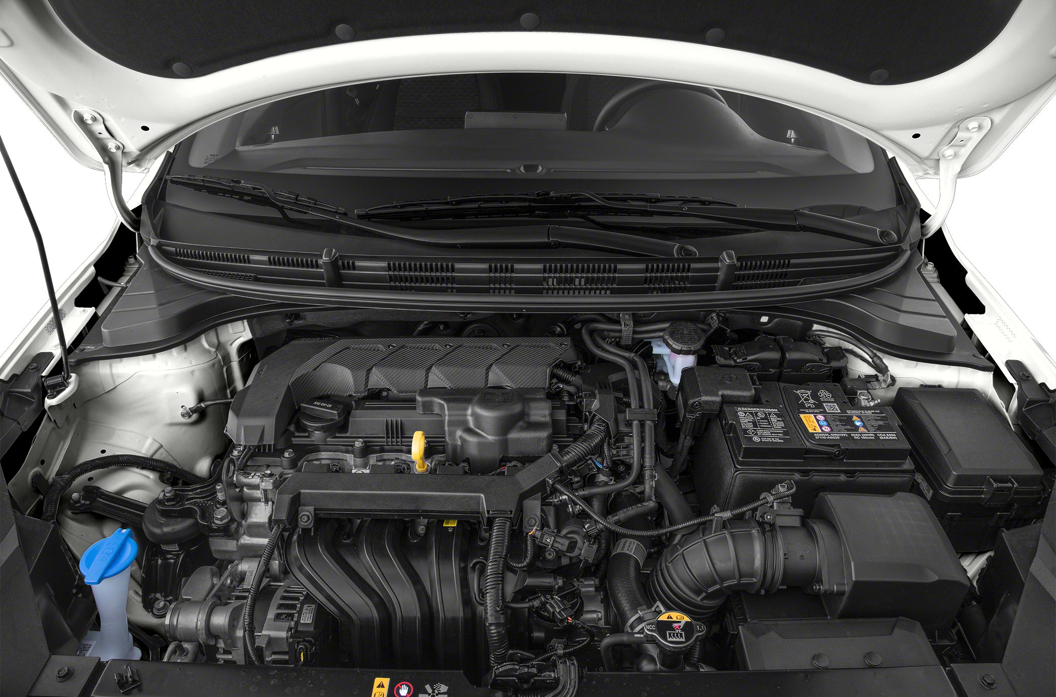 Engine compartment with visible components under open bonnet
