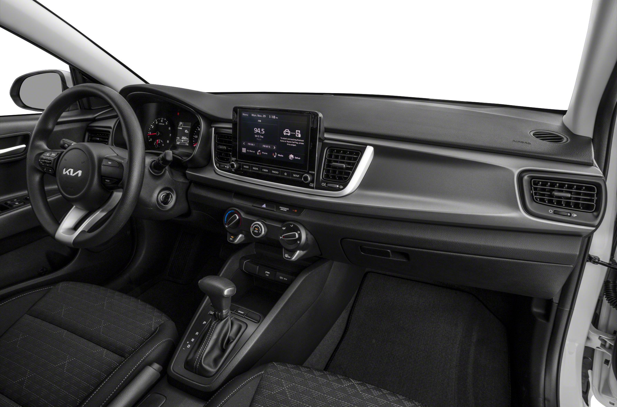 Interior with infotainment screen, automatic transmission, and climate controls