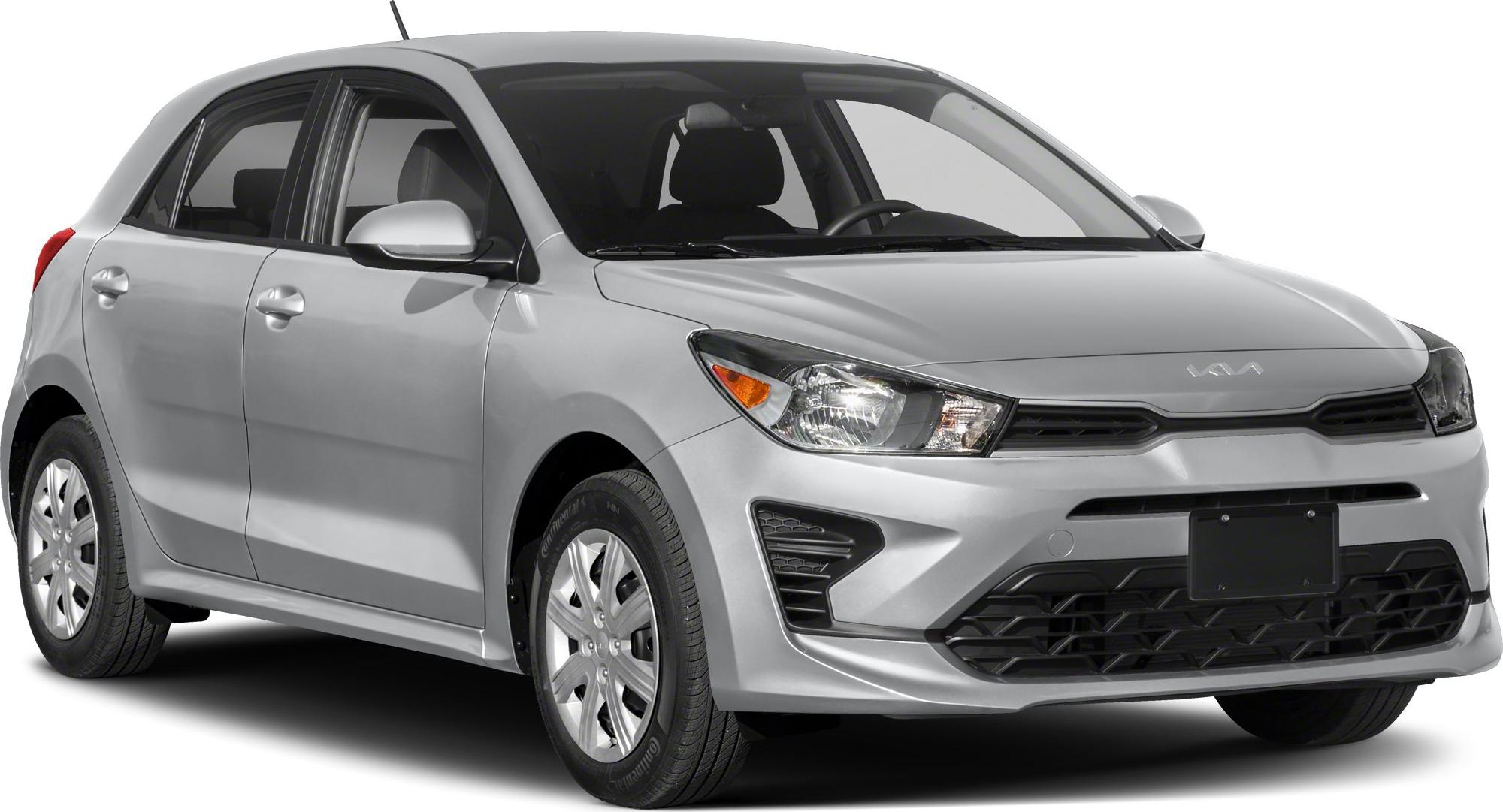 Silver hatchback front side view with headlights and grille