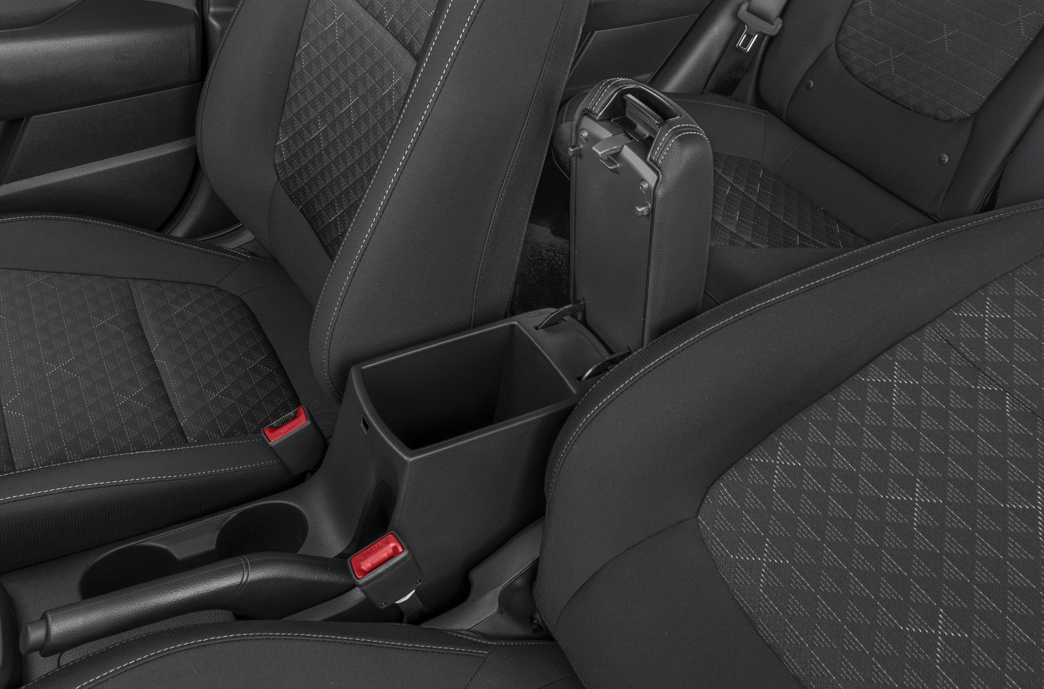 Black patterned seats with open center armrest storage compartment