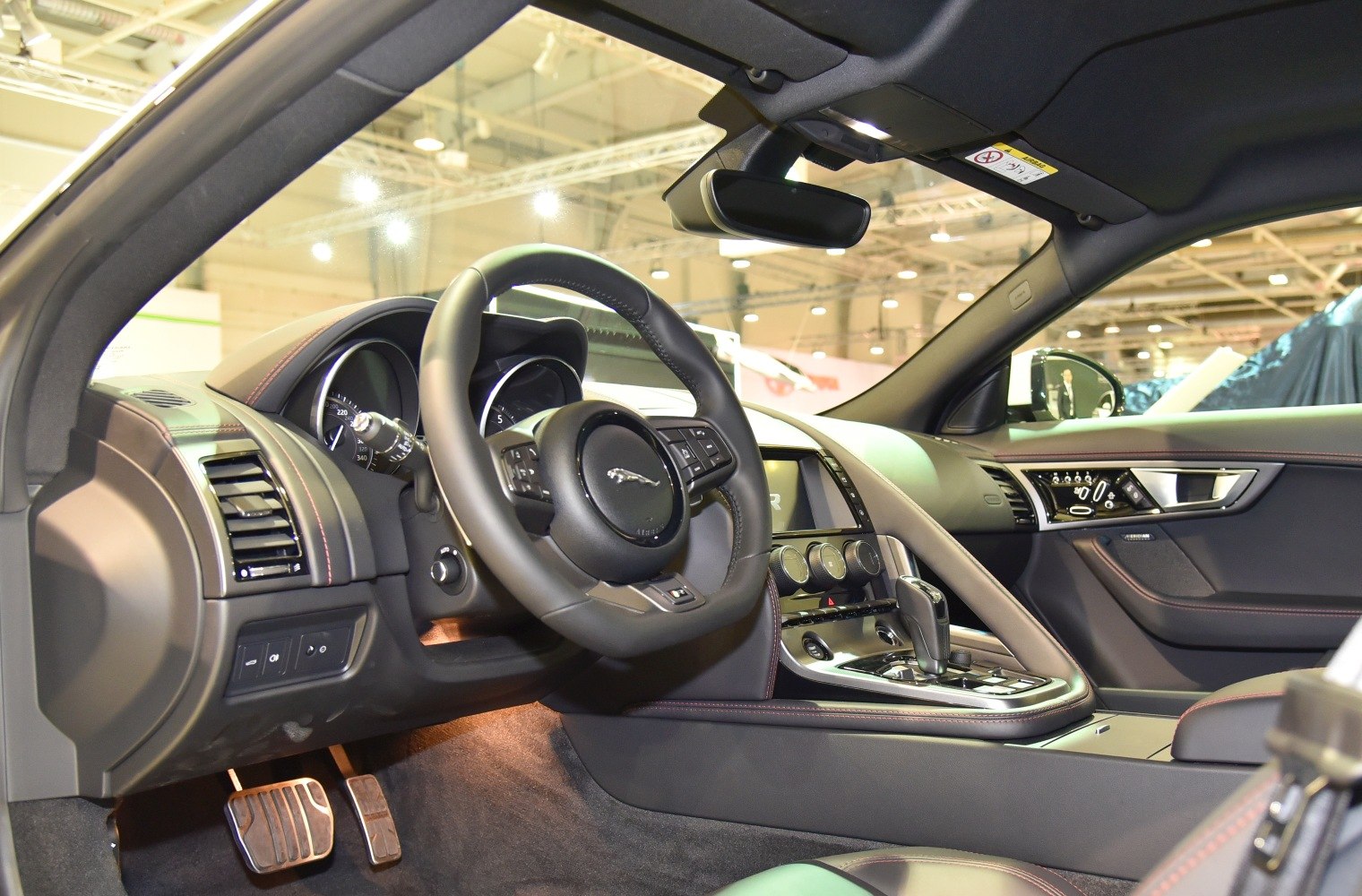 Luxurious interior dashboard with steering wheel and control panel