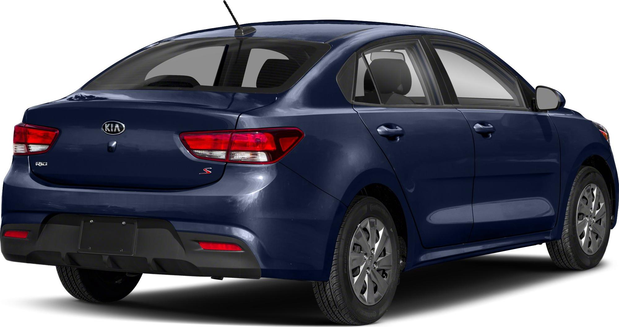 Blue compact four-door sedan rear three-quarter view with taillights