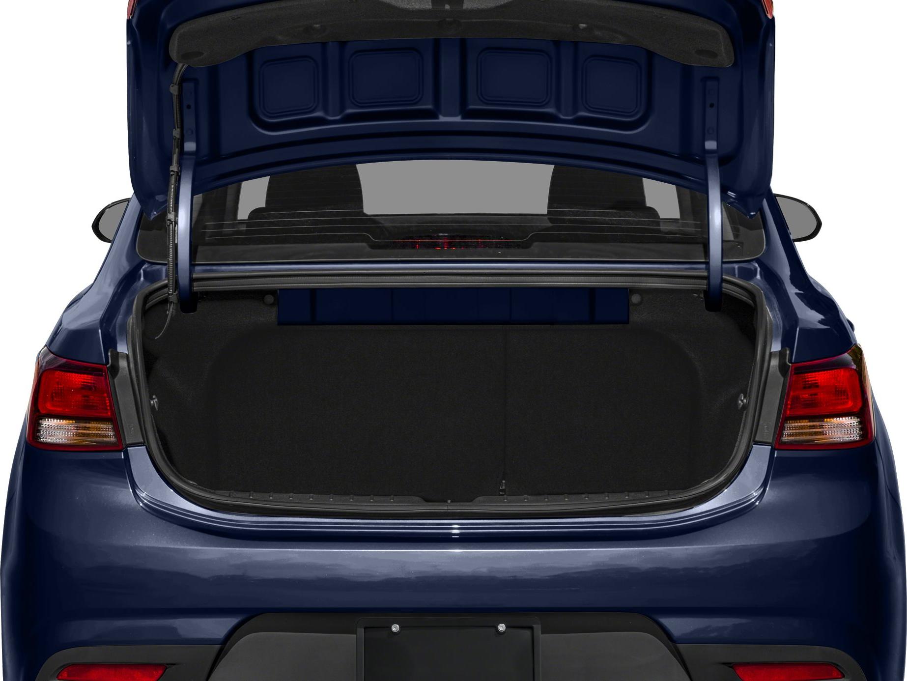 Open trunk rear with spacious storage area in compact sedan