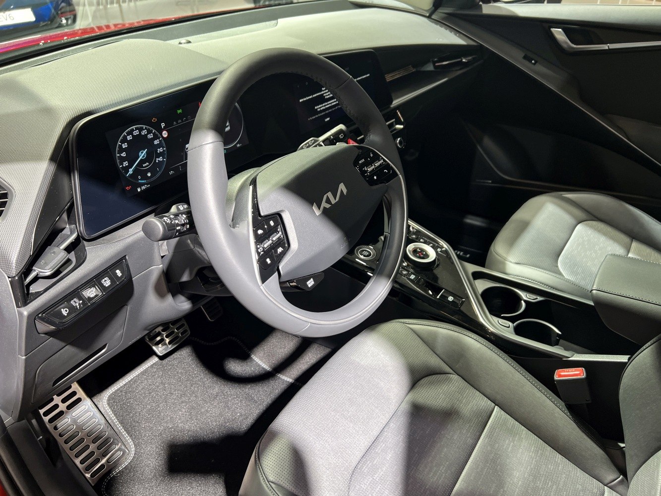 Digital instrument cluster and multifunction steering wheel in modern car interior