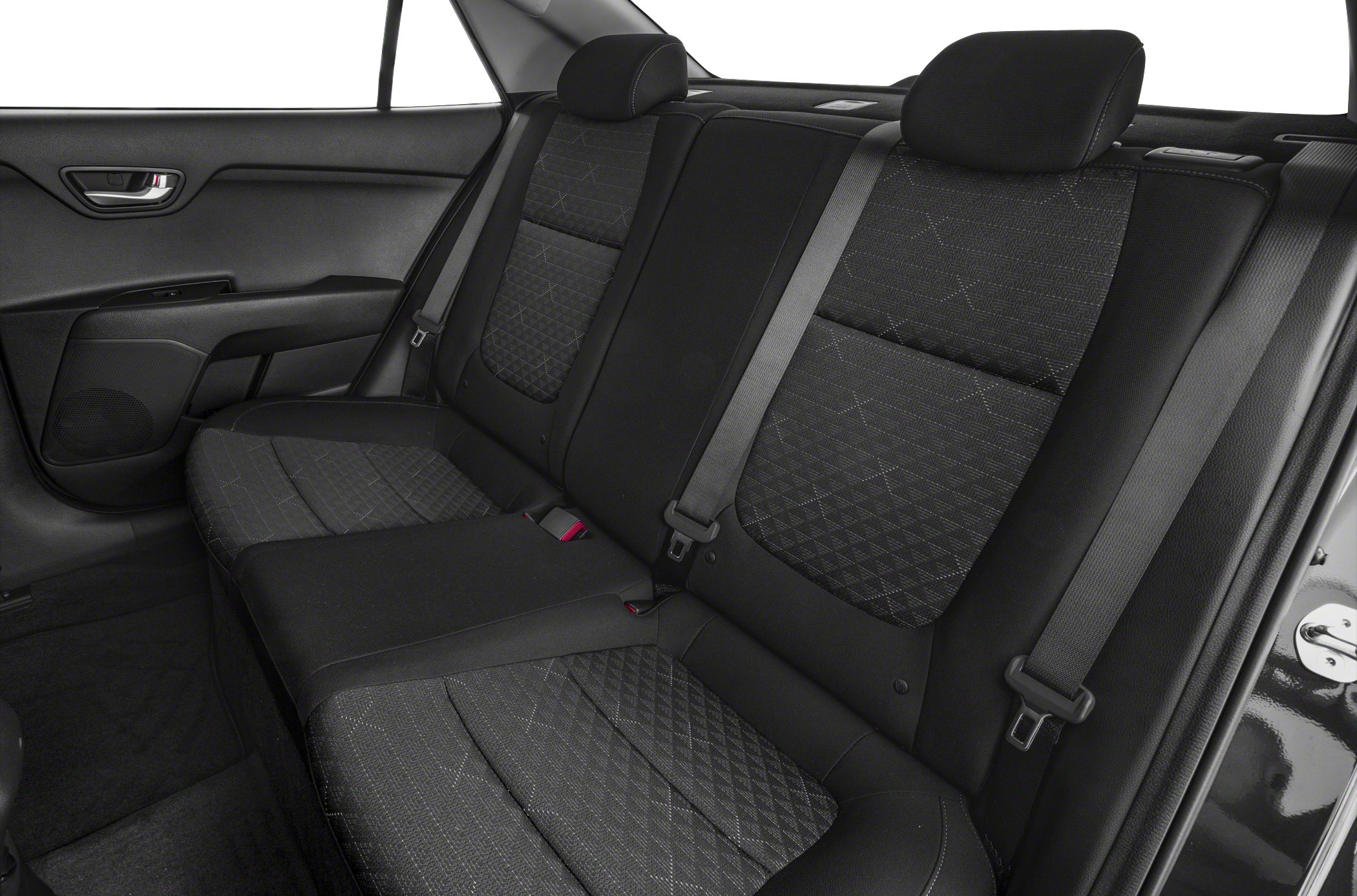 Rear seat interior with fabric upholstery and seatbelts