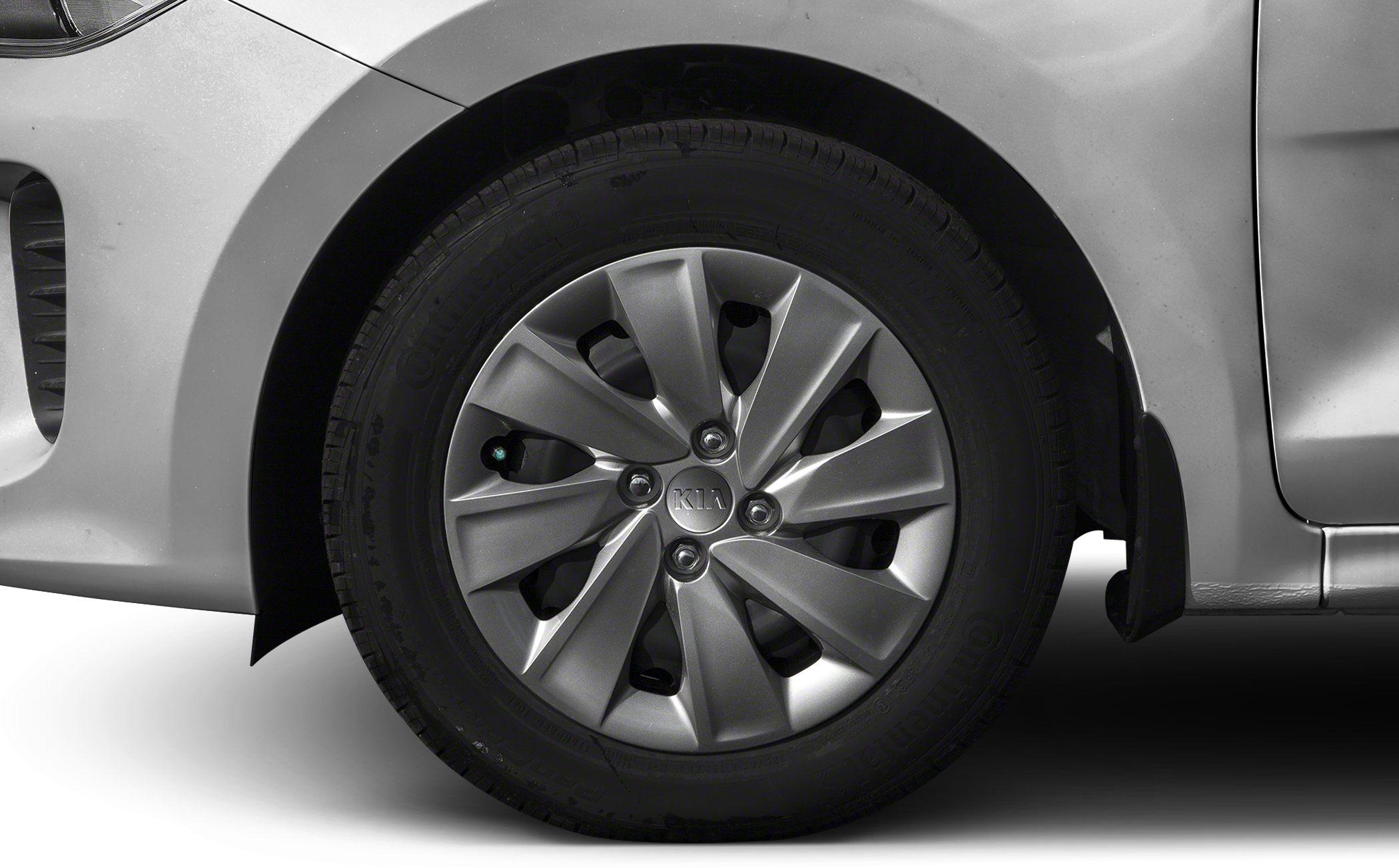 Close-up of alloy wheel and tire on a hatchback.