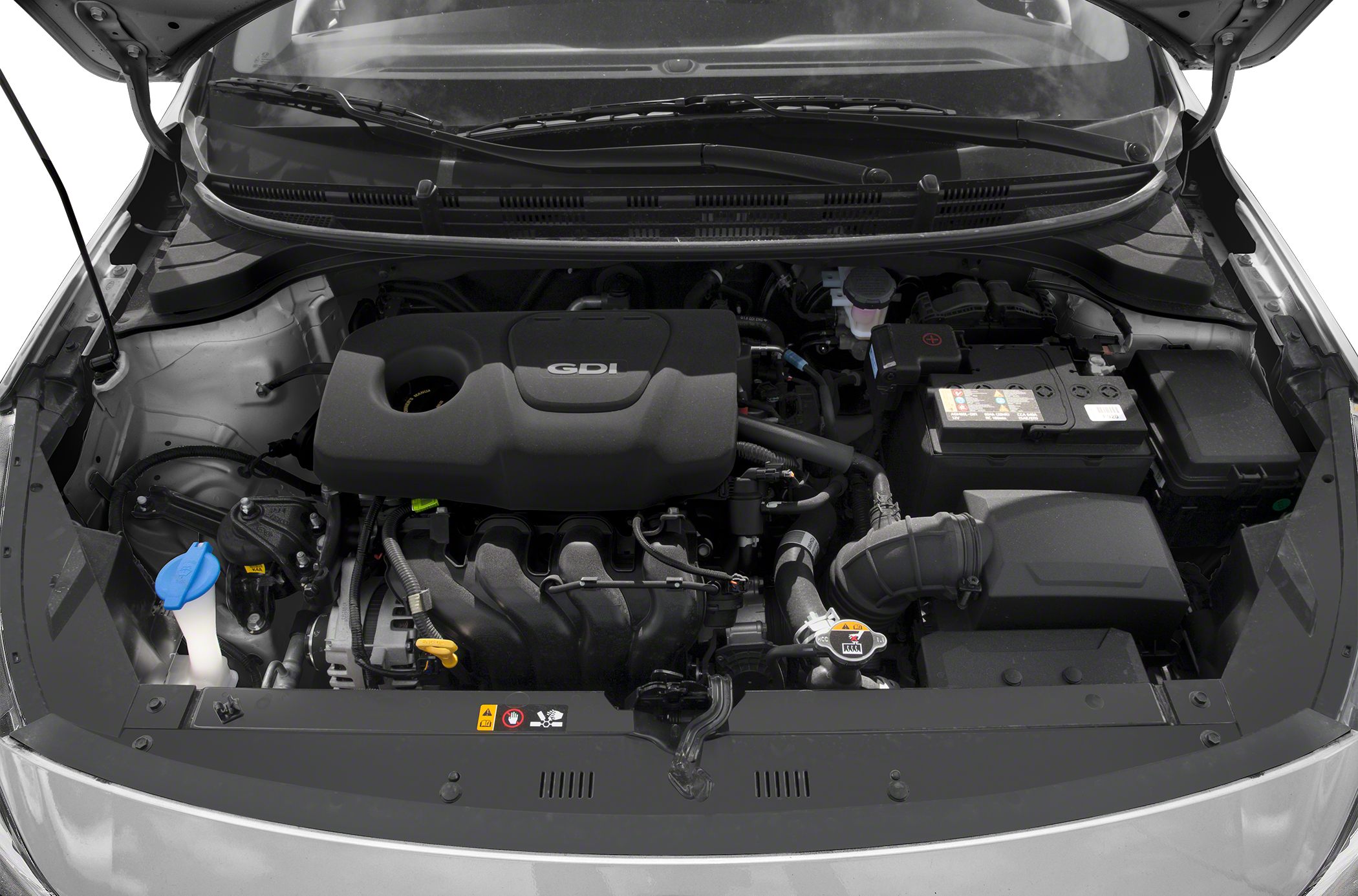 Compact GDI engine bay with battery and radiator cap