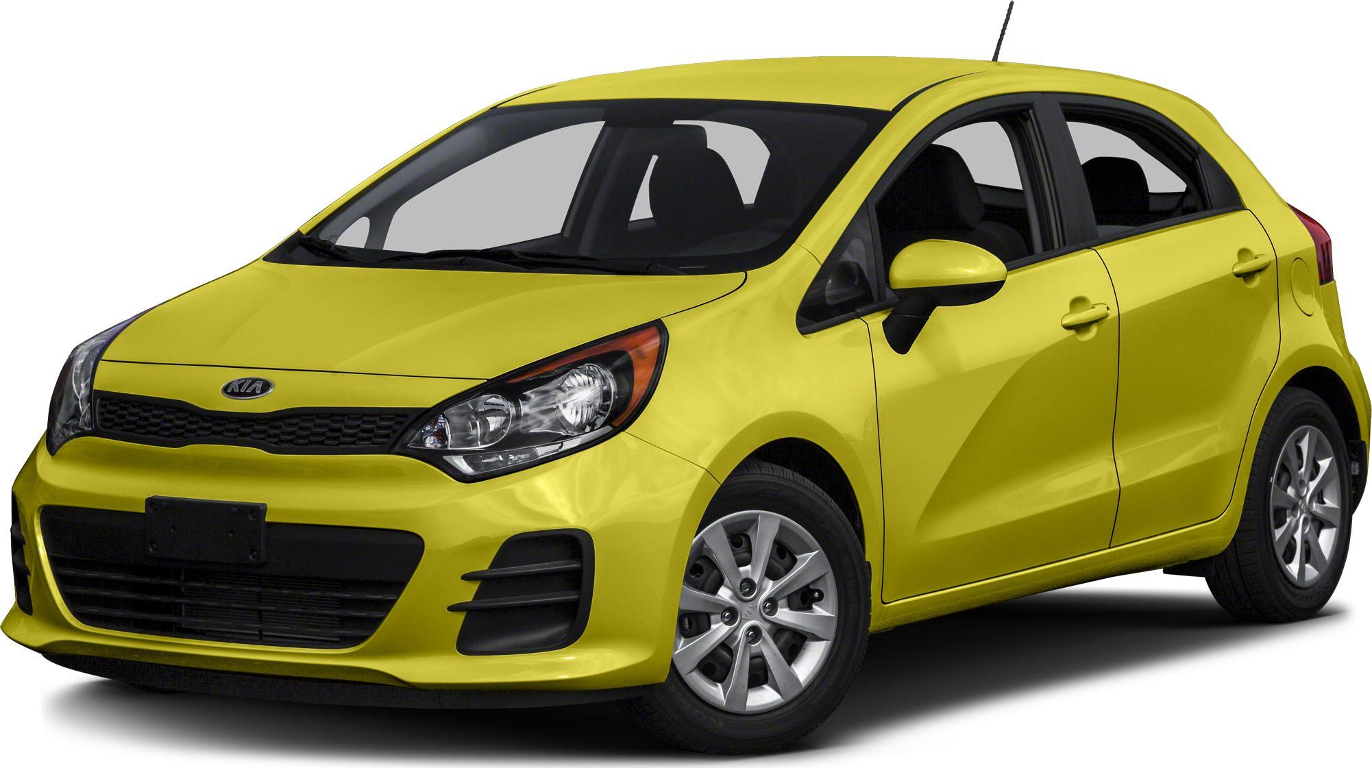 Yellow hatchback front side view with headlight and grille