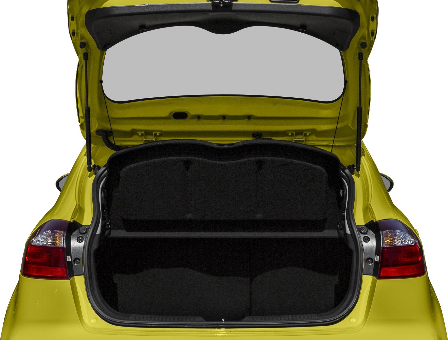 Open trunk view of a compact hatchback with rear lights visible