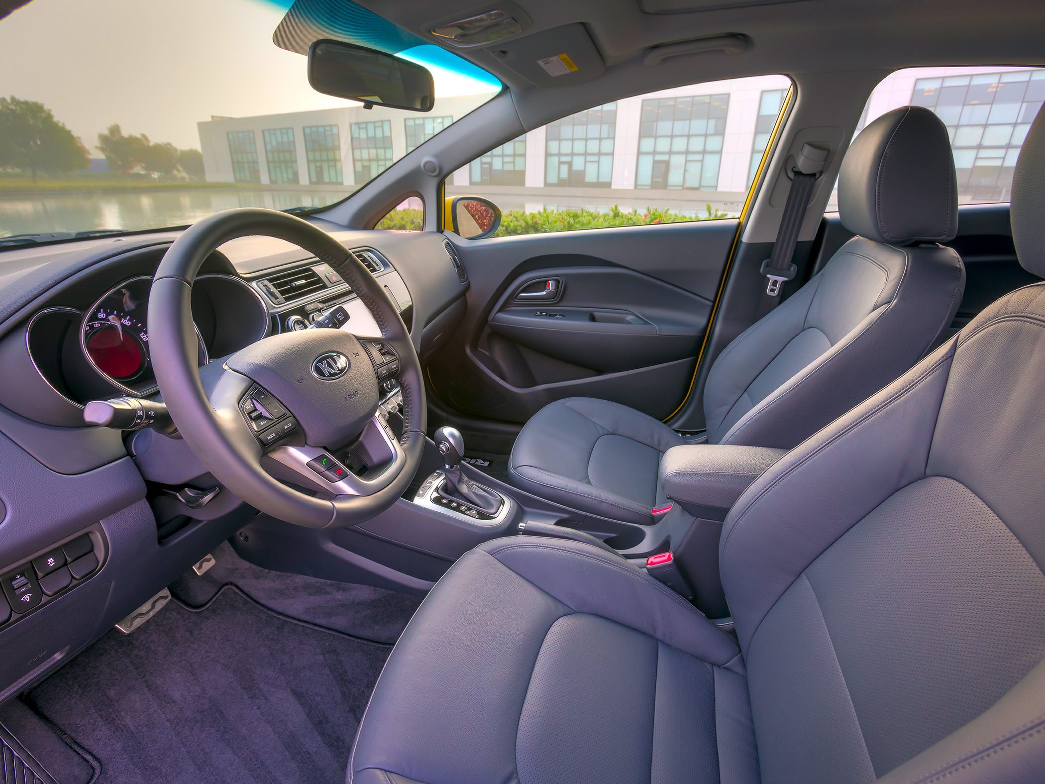 Modern car interior with leather seats and dashboard controls