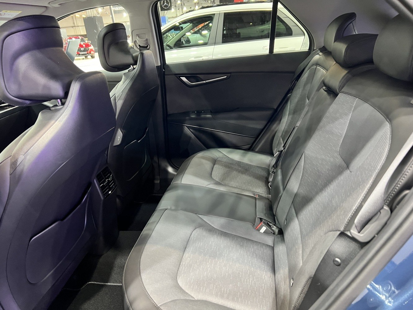 Rear seat interior with premium upholstery and spacious layout