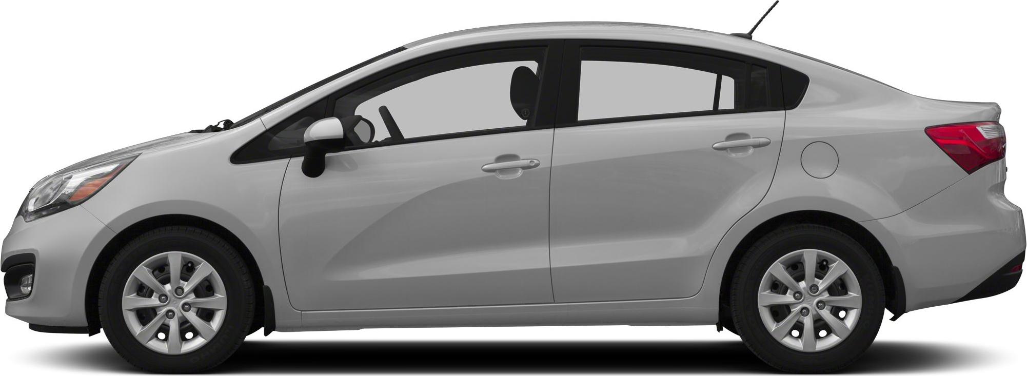 Side profile of a silver compact sedan with alloy wheels