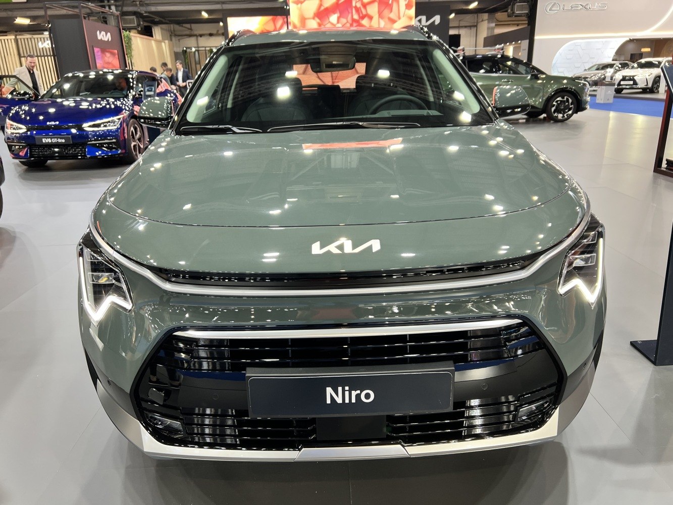 Front view featuring new Kia logo and LED headlights
