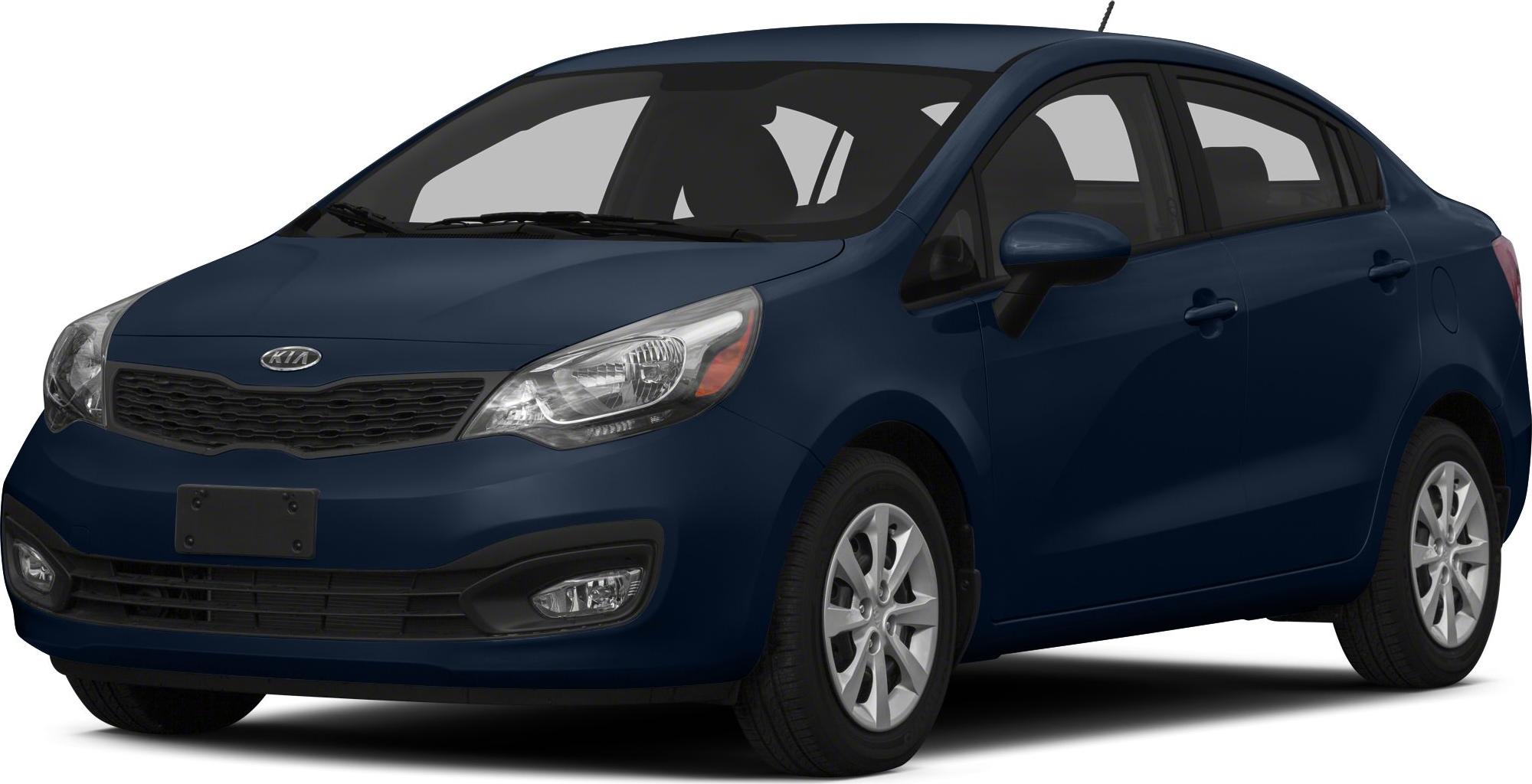 Front grille, headlights, and fog lights of a dark blue sedan