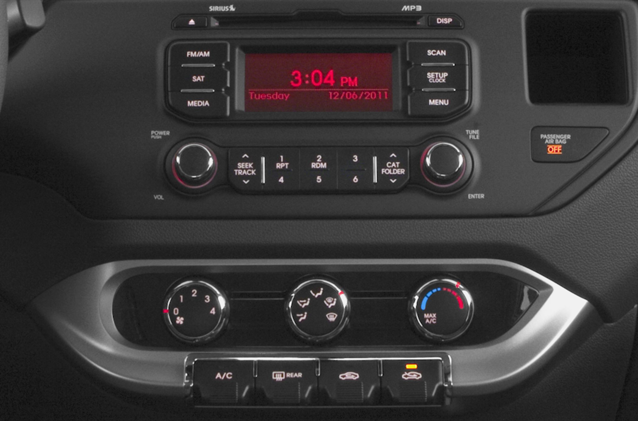Audio system and climate control panel with knobs and buttons