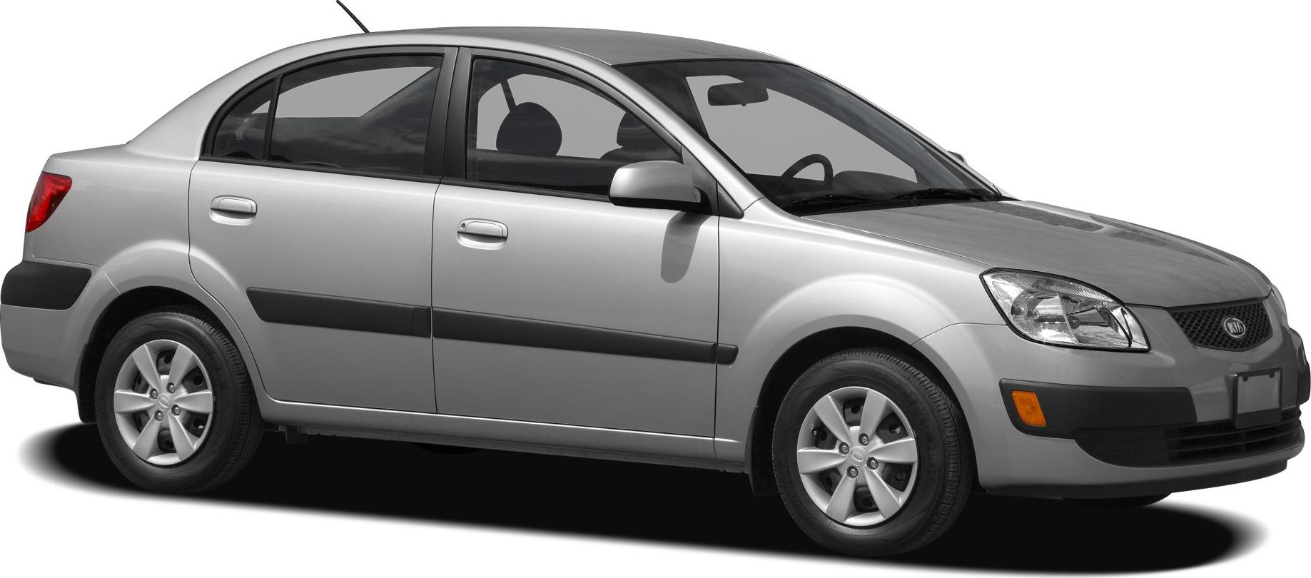 Side profile of a sedan with silver alloy wheels and black side trim