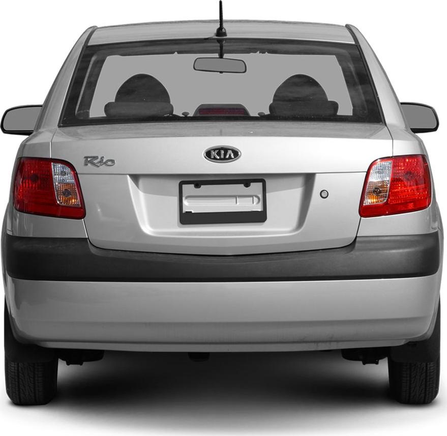 Compact sedan rear with taillights, bumper, and rear window.