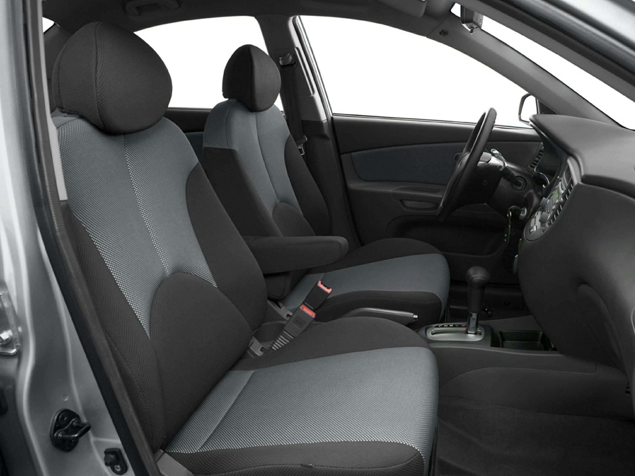 Fabric front seats with center armrest and dashboard interior layout