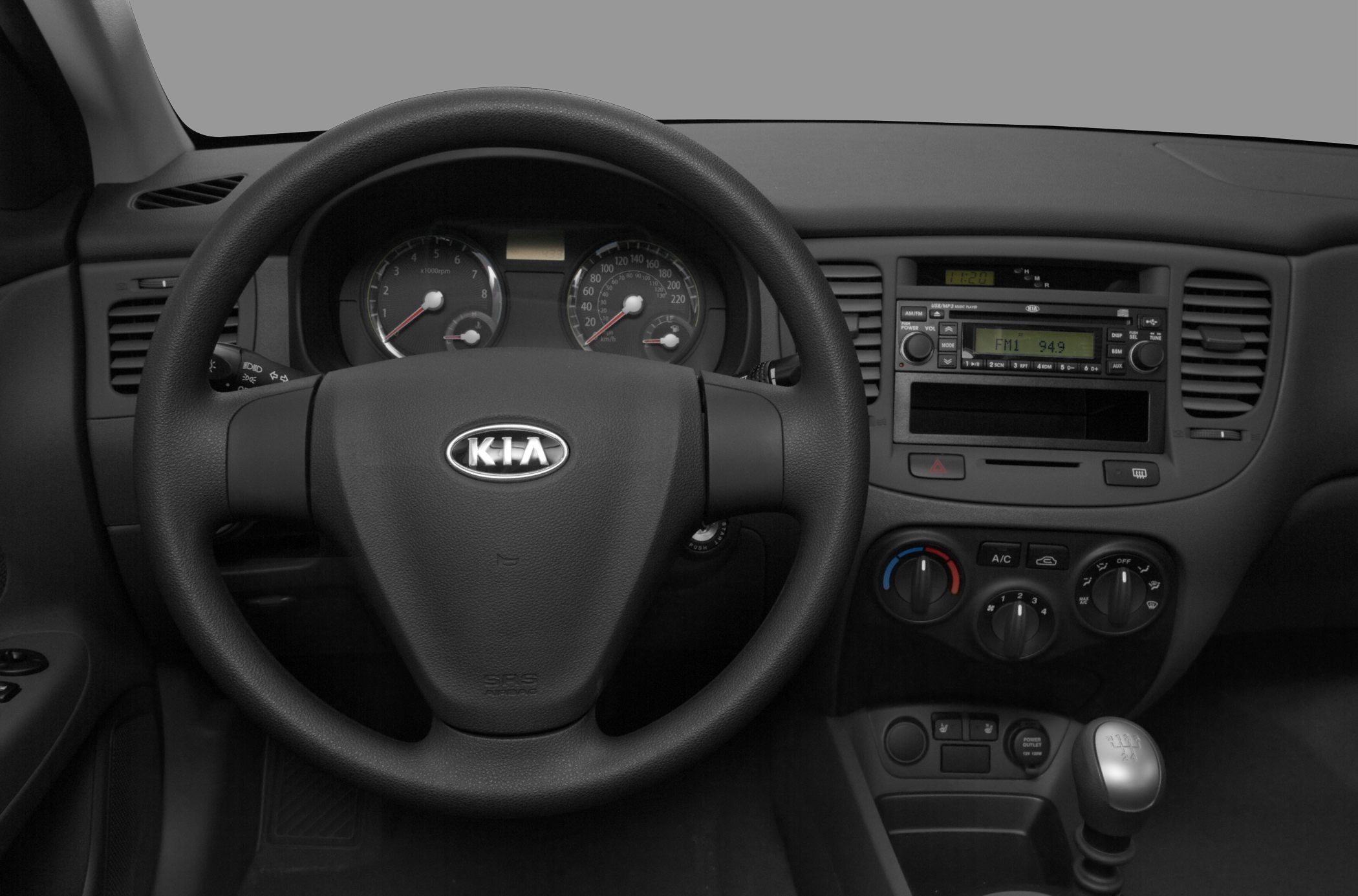 Steering wheel, dashboard with speedometer and controls