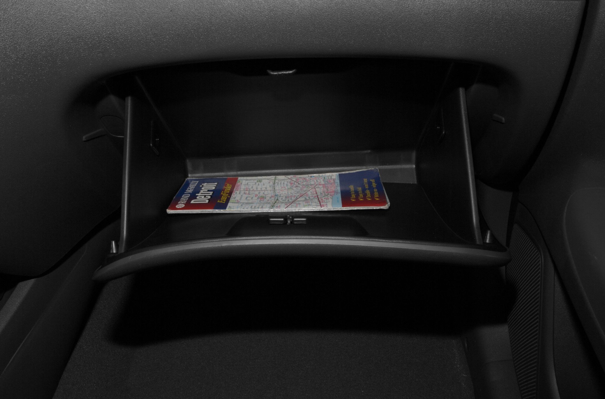 Car glove box with a map inside