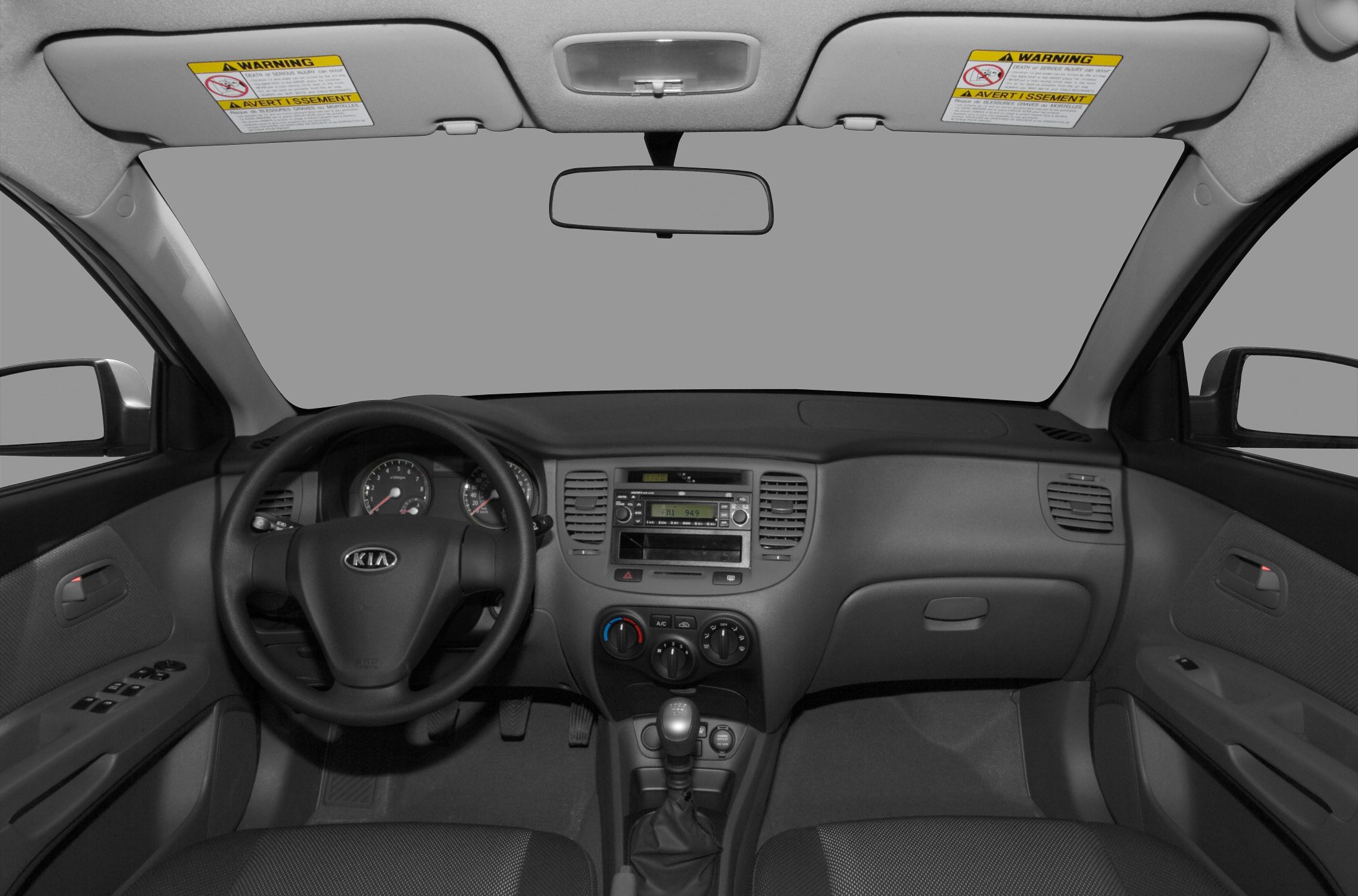 Dashboard and steering wheel with control panel and manual gear shift