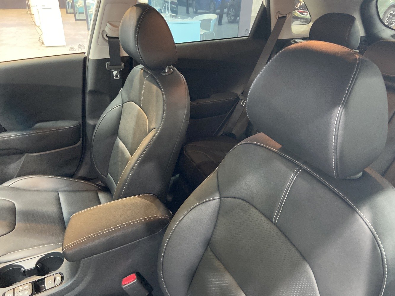 Front seats with leather upholstery and detailed stitching