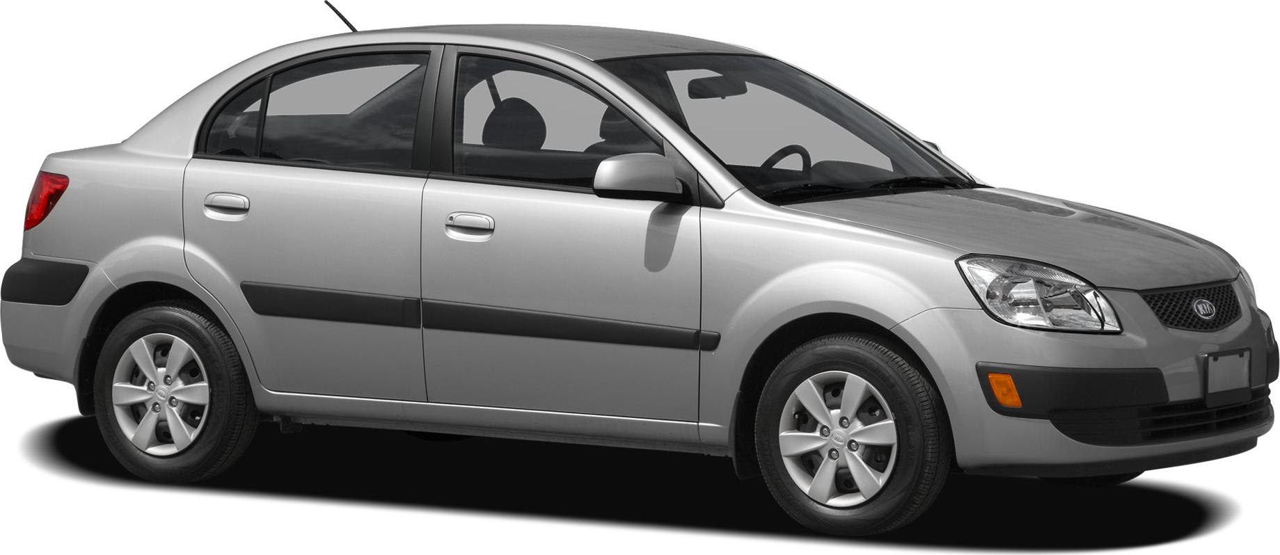 Side profile of sedan with alloy wheels and black side molding