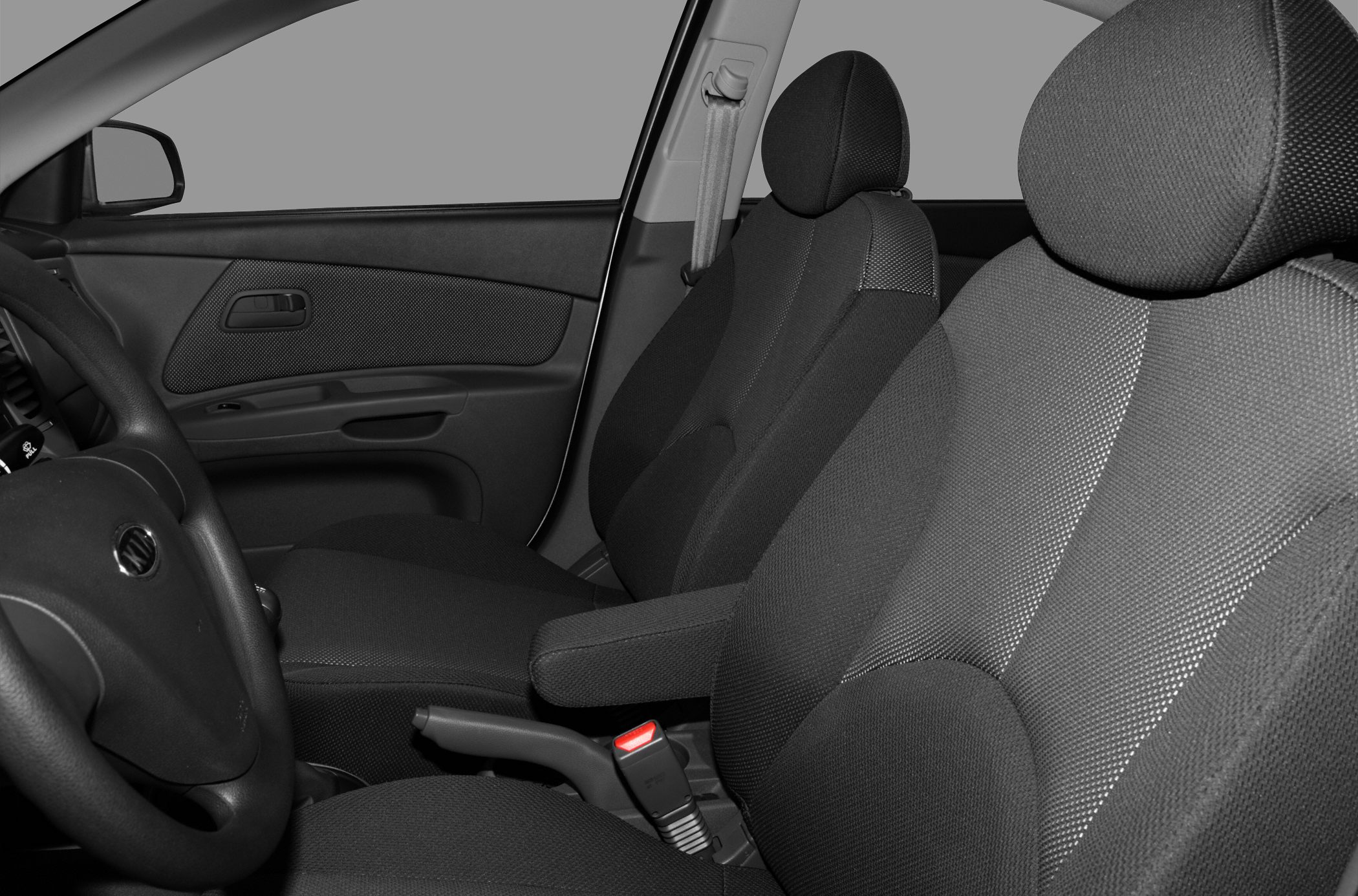 Front fabric seats with armrest and door panel interior