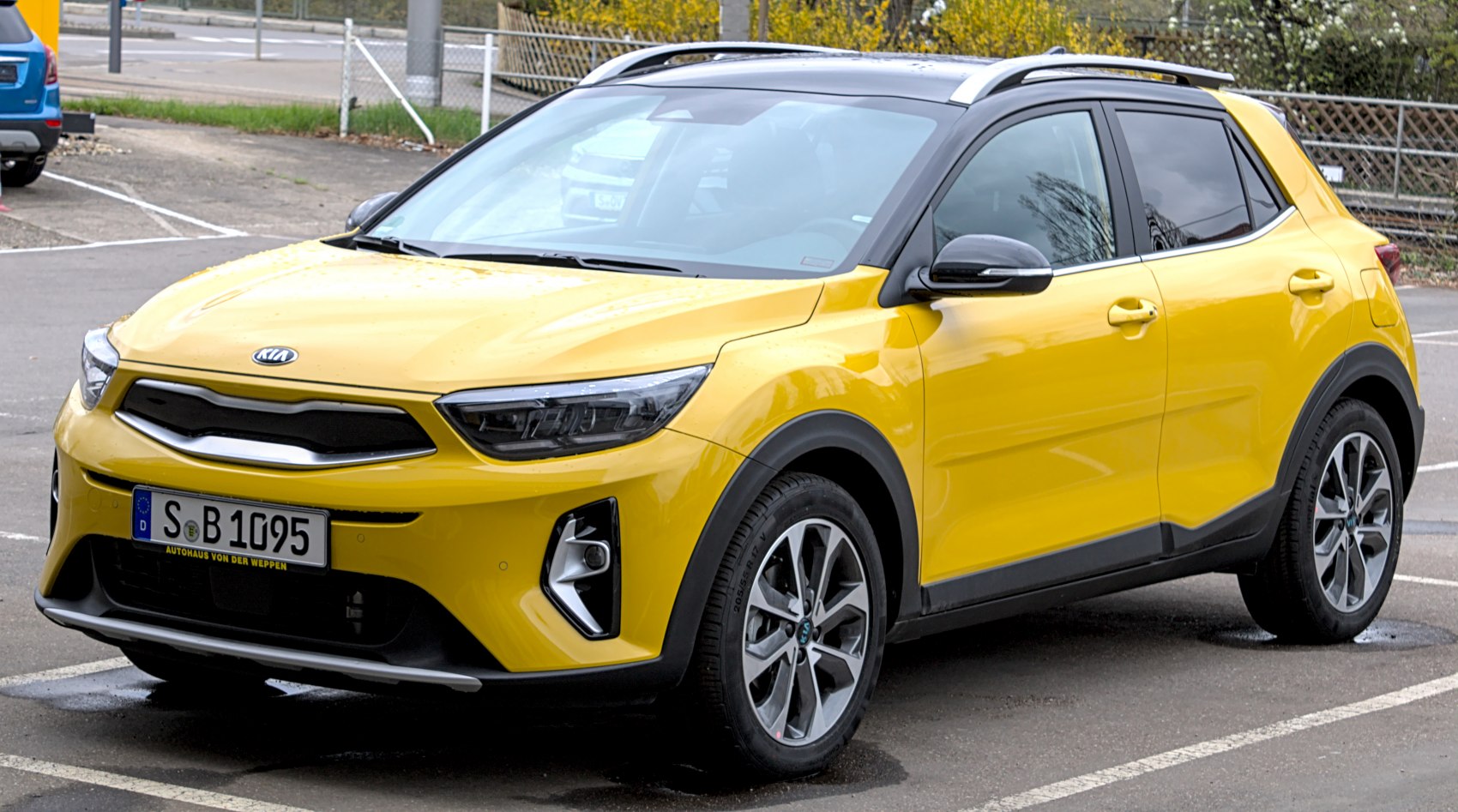 Yellow compact SUV with LED headlights and alloy wheels