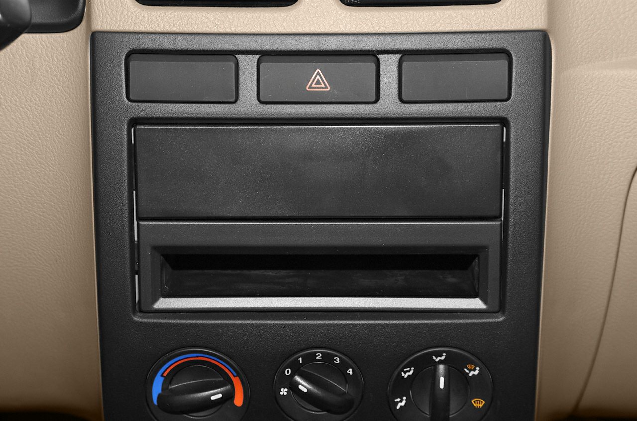 Dashboard control panel with climate and hazard controls