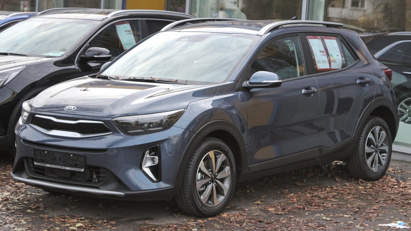 Front and side view of compact SUV with LED headlights and alloy wheels