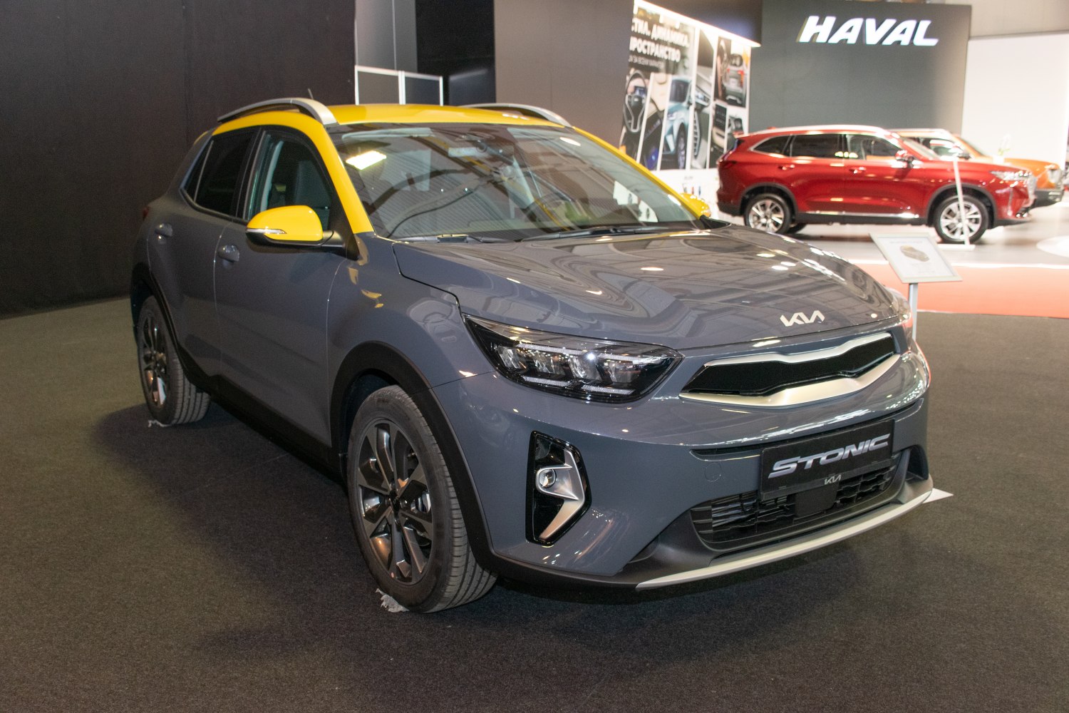 Front view with sleek headlights and two-tone roof design