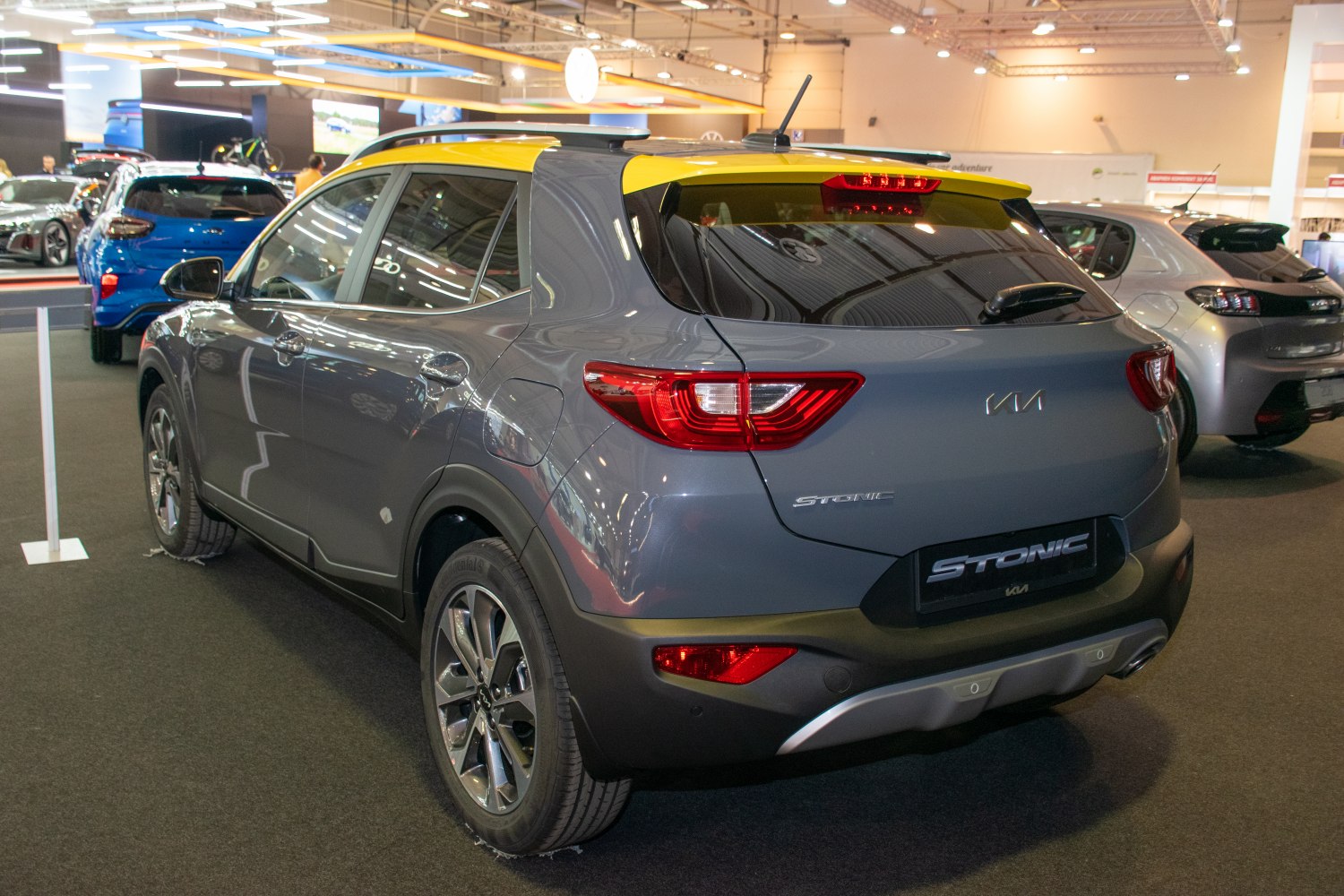 Compact SUV rear view with yellow roof and distinctive taillights
