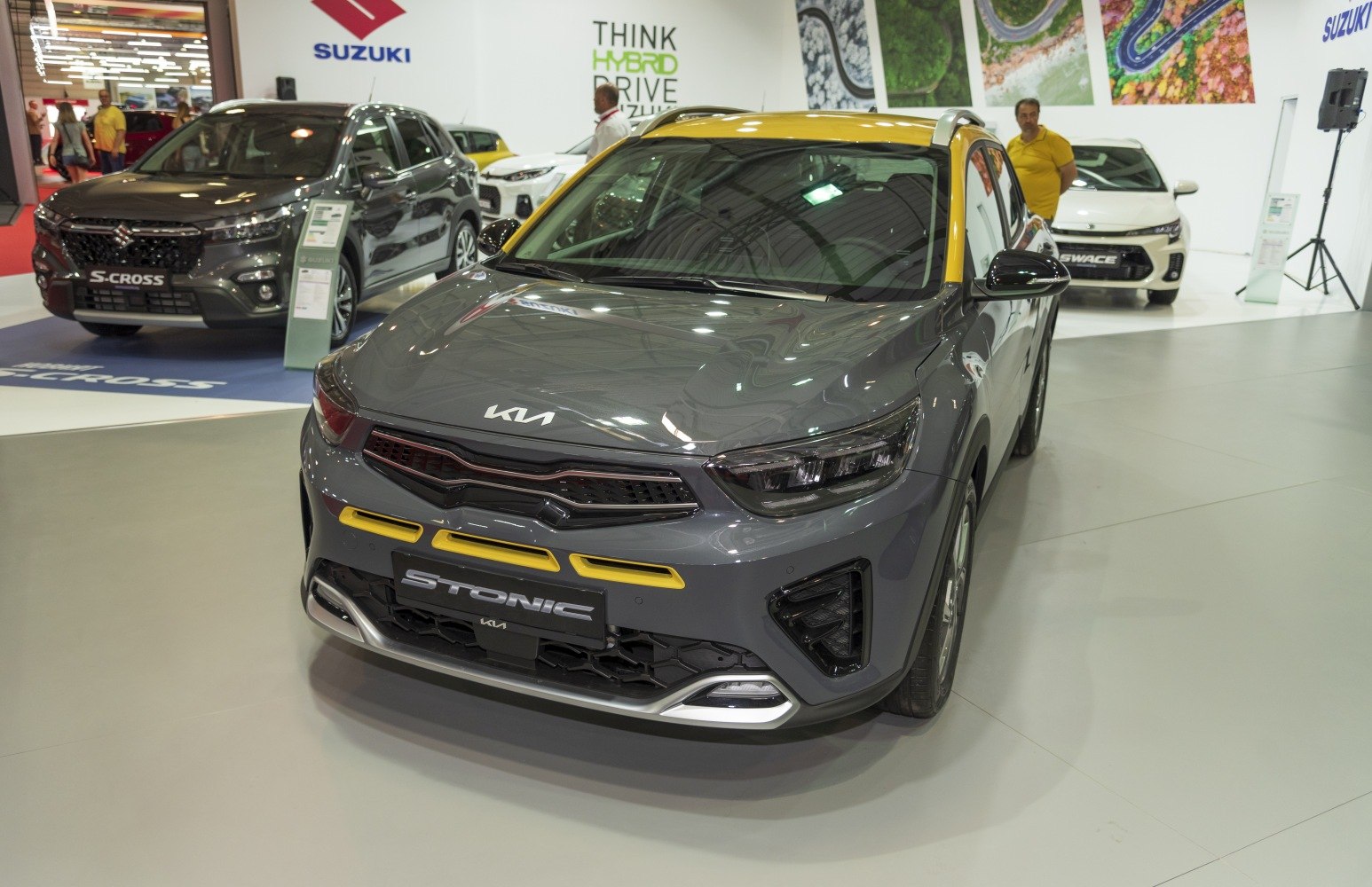 Front fascia with yellow accent and dual-tone roof