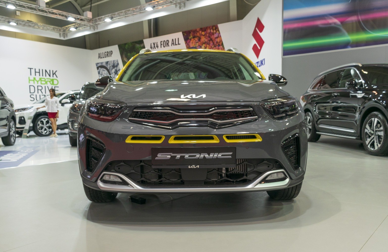 Front view with updated grille, headlights, and yellow accent details