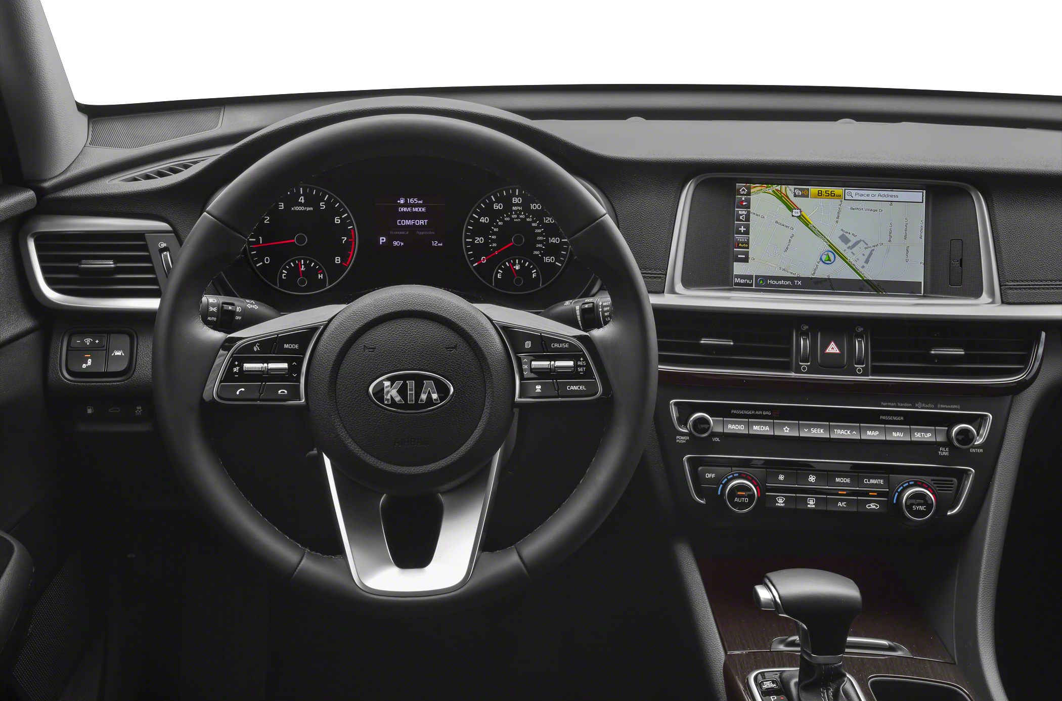 Steering wheel, dashboard with navigation and climate control.