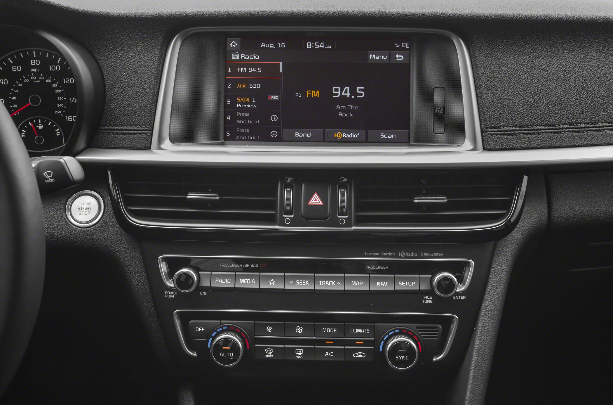 Infotainment display and climate control panel with start-stop button