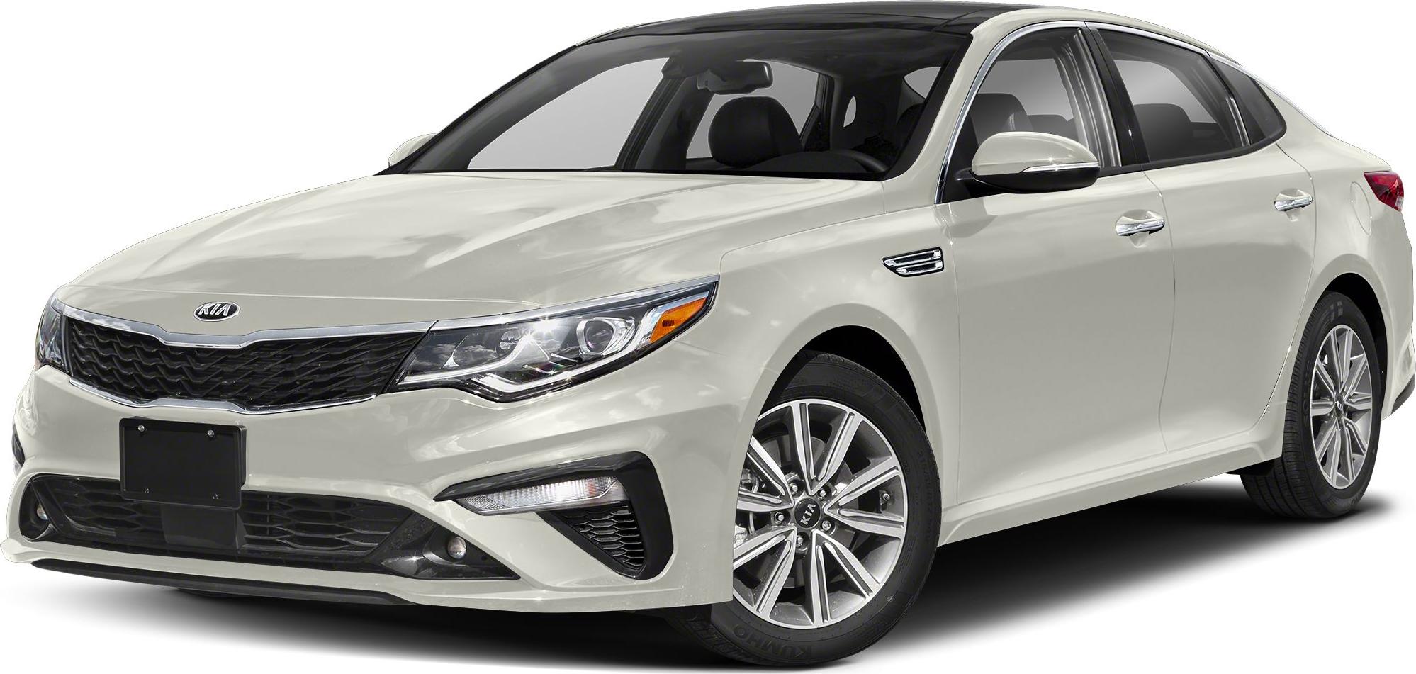 White mid-size sedan with alloy wheels and modern front grille