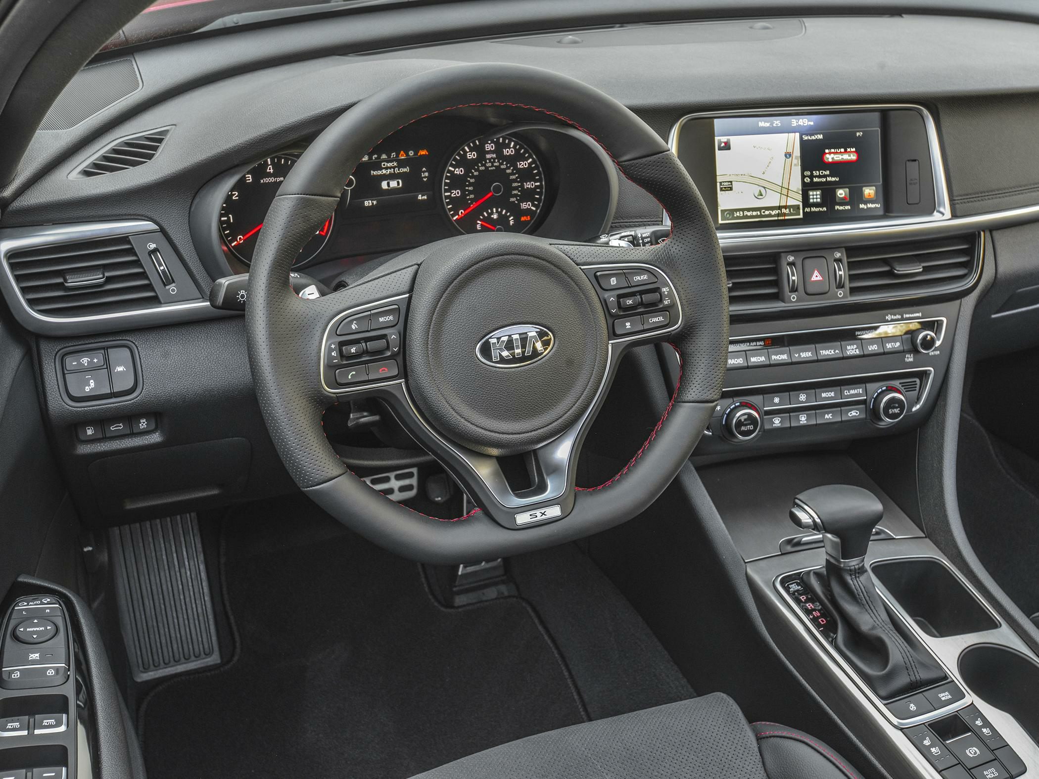 Interior dashboard with multifunction steering wheel and infotainment screen