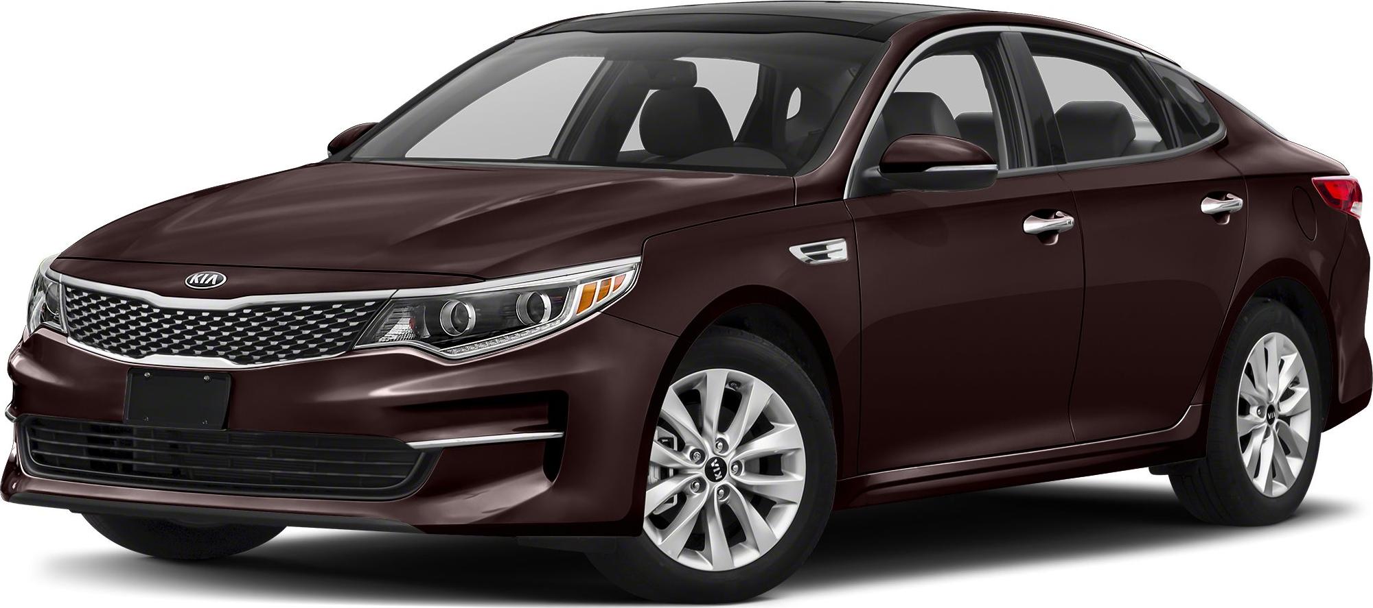 Front grille and dual projector headlights of a modern mid-size sedan