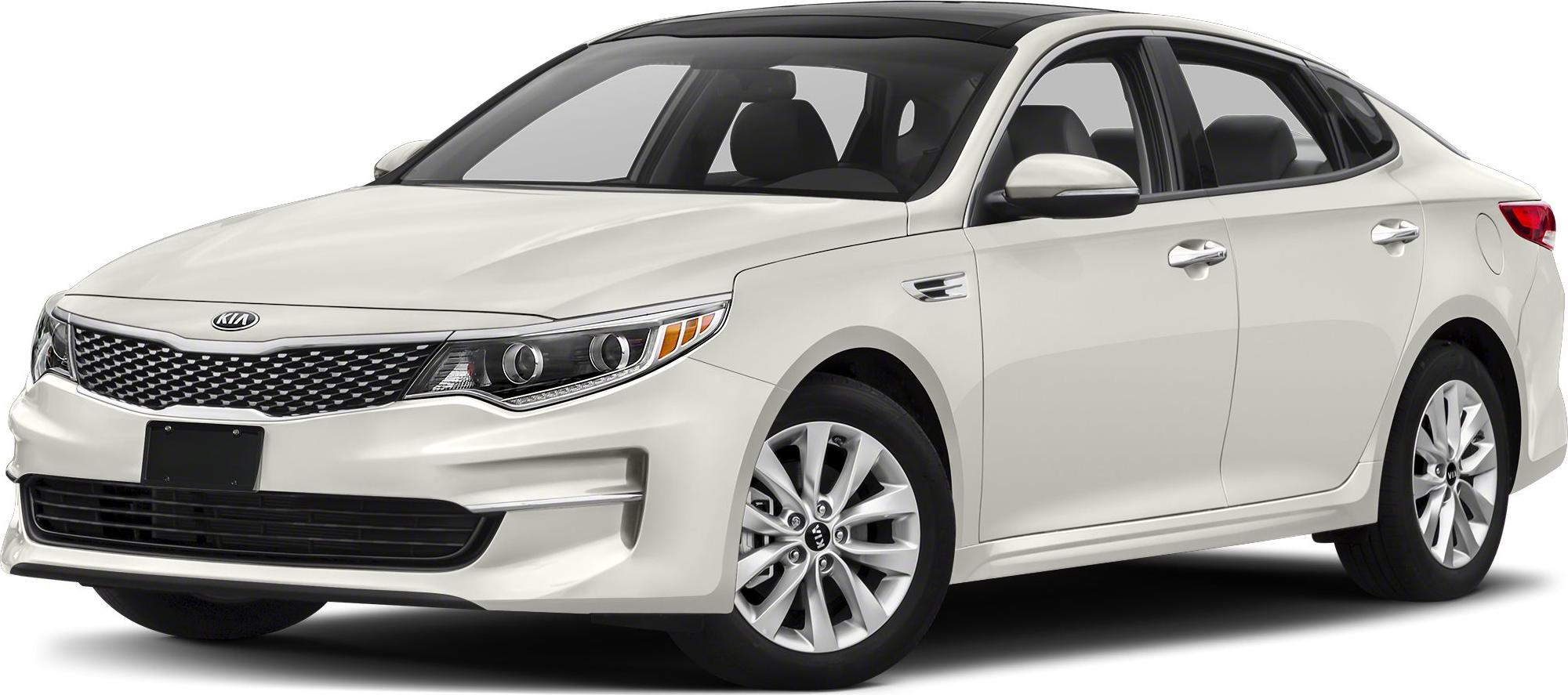 White midsize sedan front side view with distinctive grille and headlights